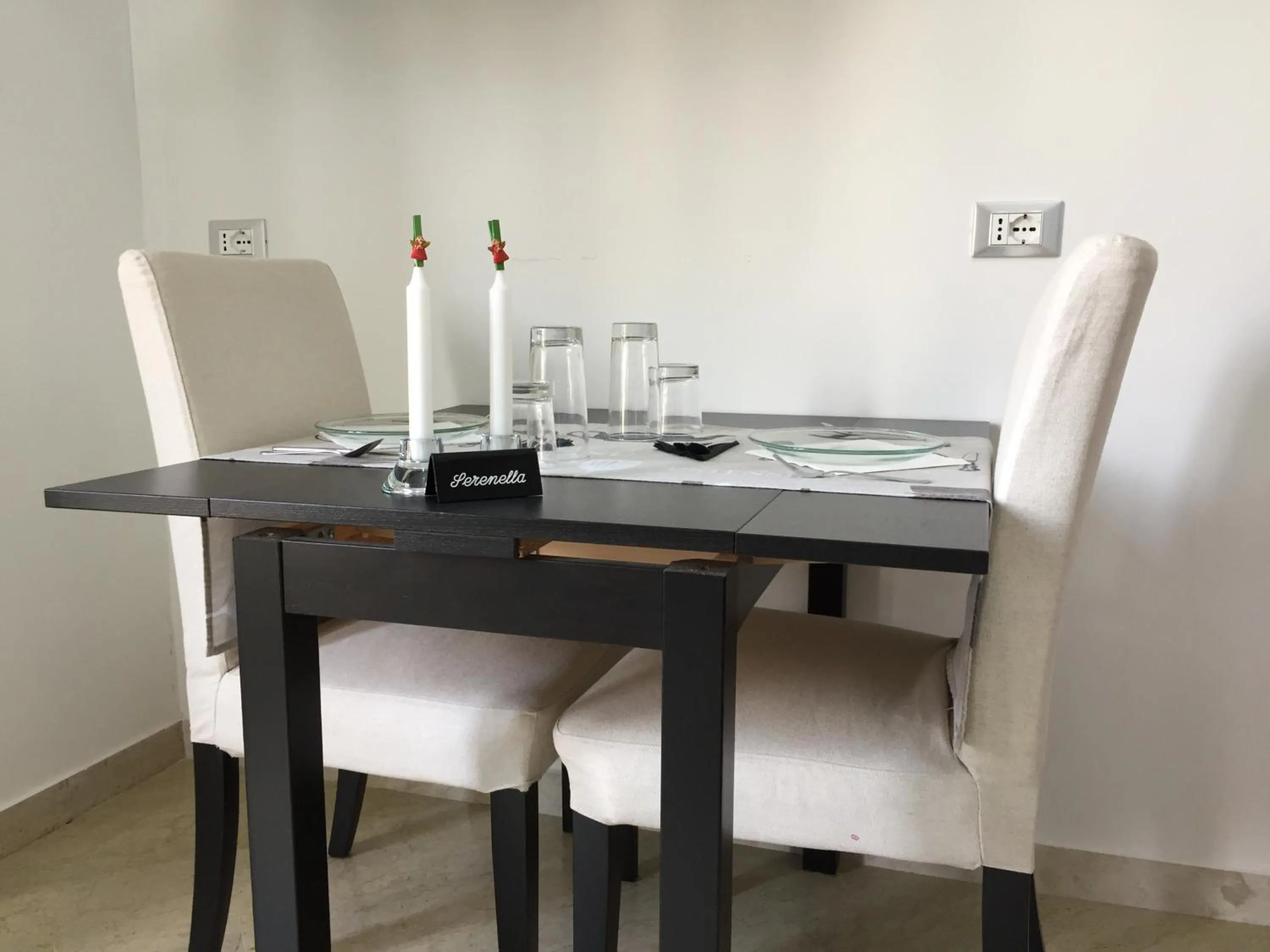 Communal lounge/ TV room in B&B Paolo e Mariella