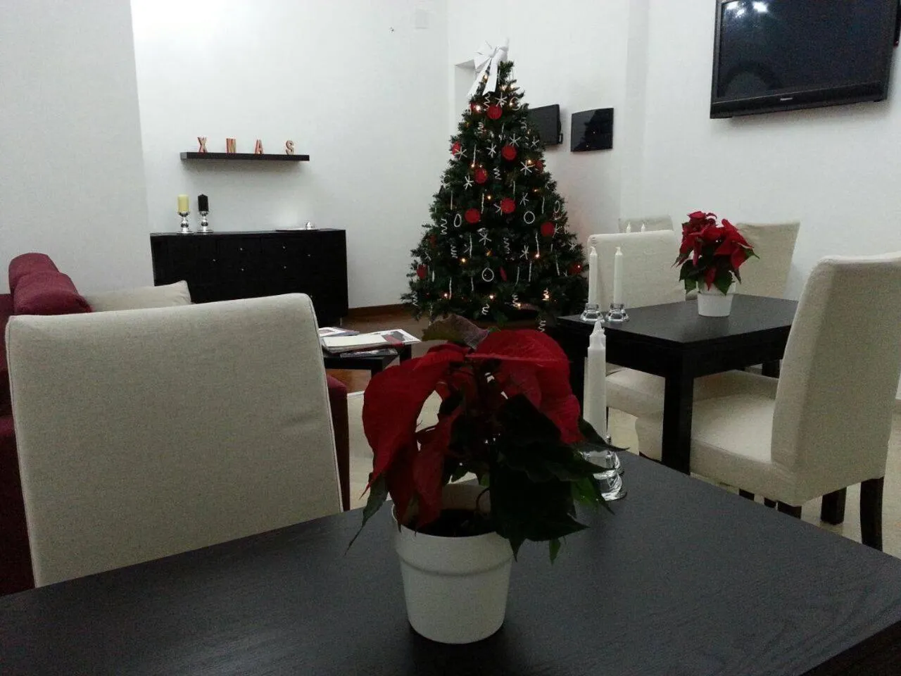 Communal lounge/ TV room in B&B Paolo e Mariella