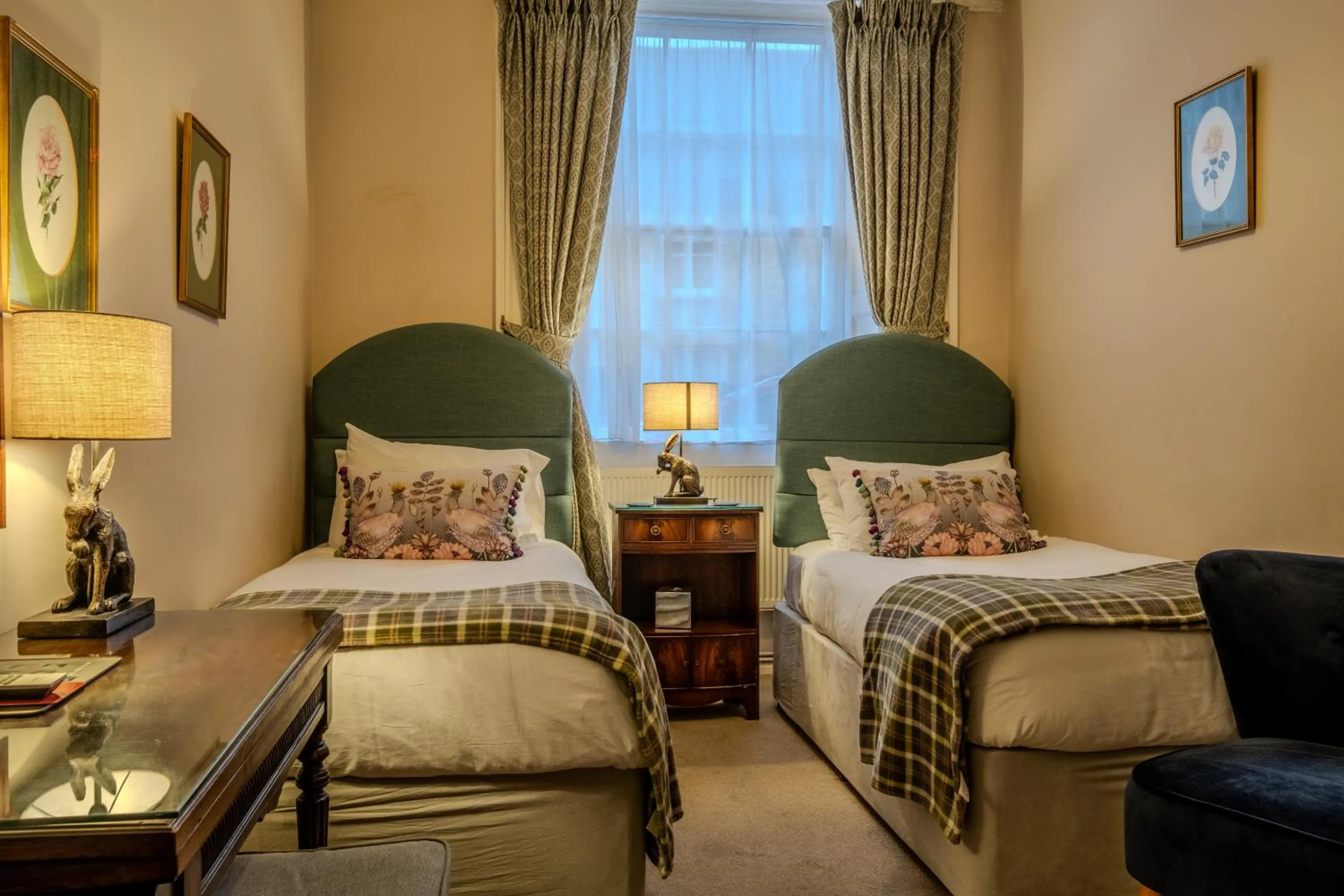 Bed in Corinium Hotel & Restaurant