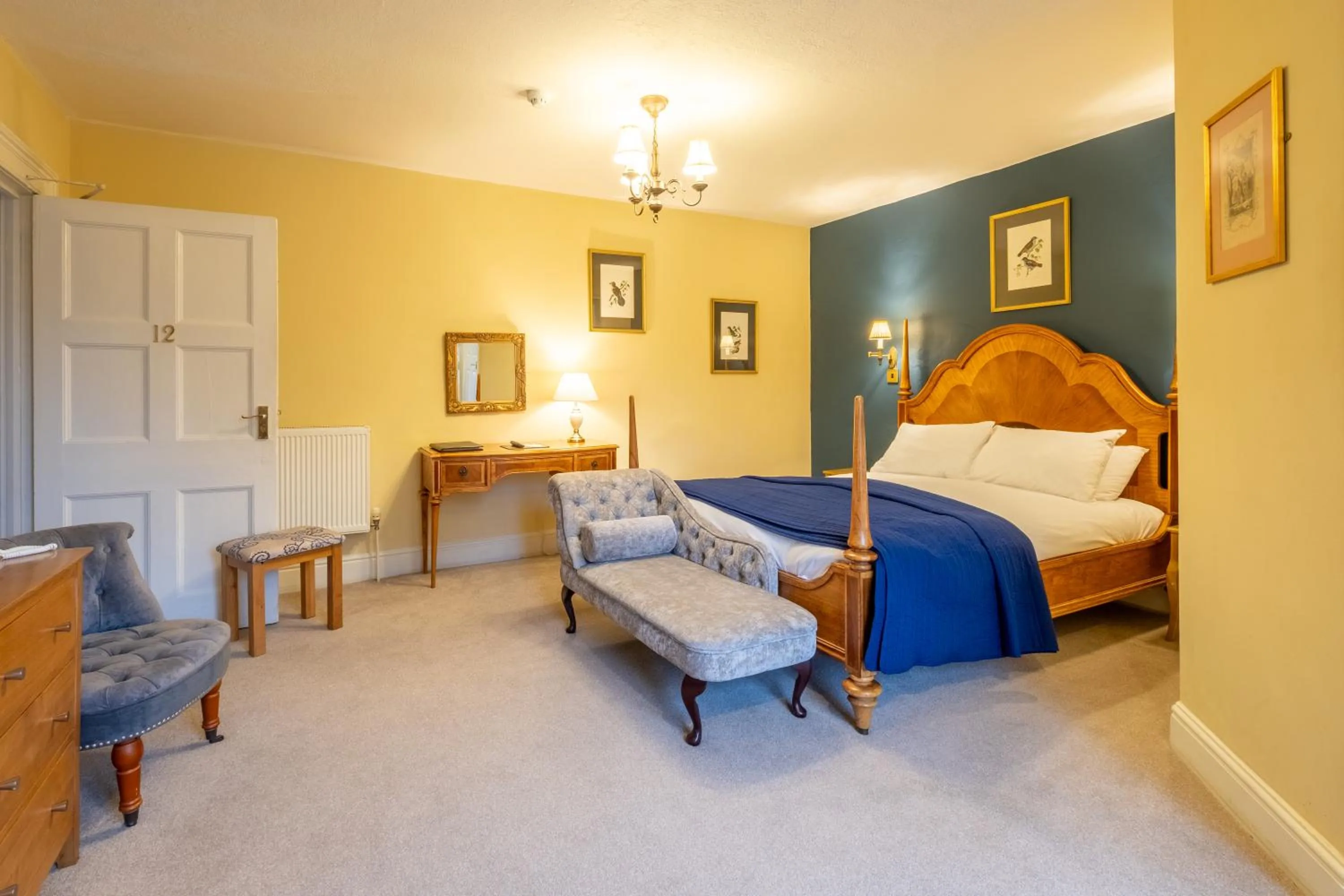 Bed in Corinium Hotel & Restaurant