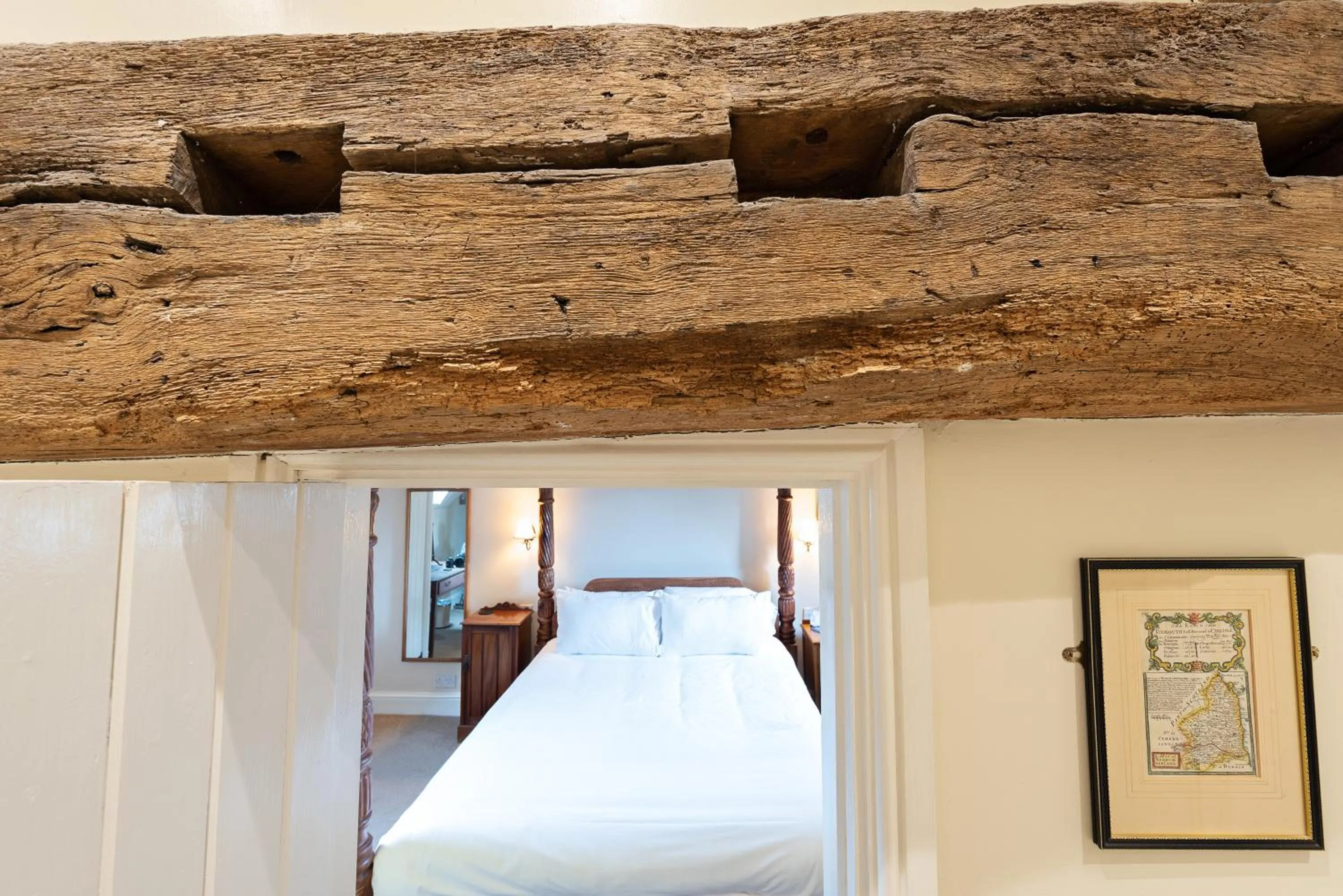 Bed in Corinium Hotel & Restaurant