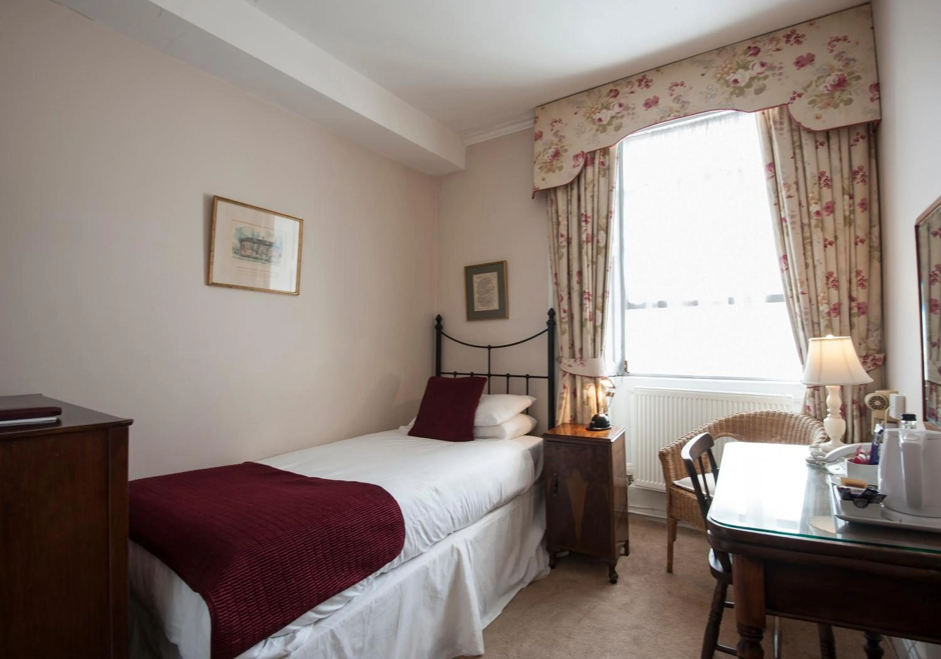 Photo of the whole room, Bed in Corinium Hotel & Restaurant