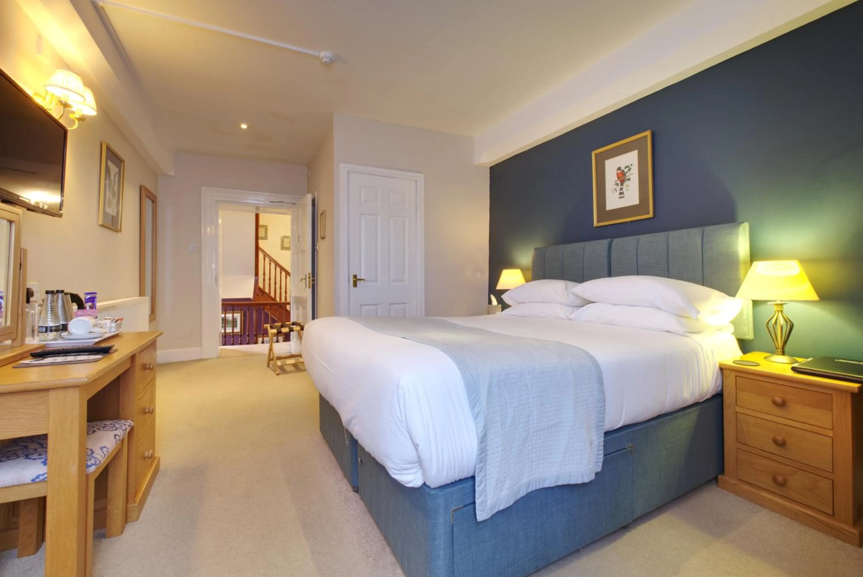 Bed in Corinium Hotel & Restaurant