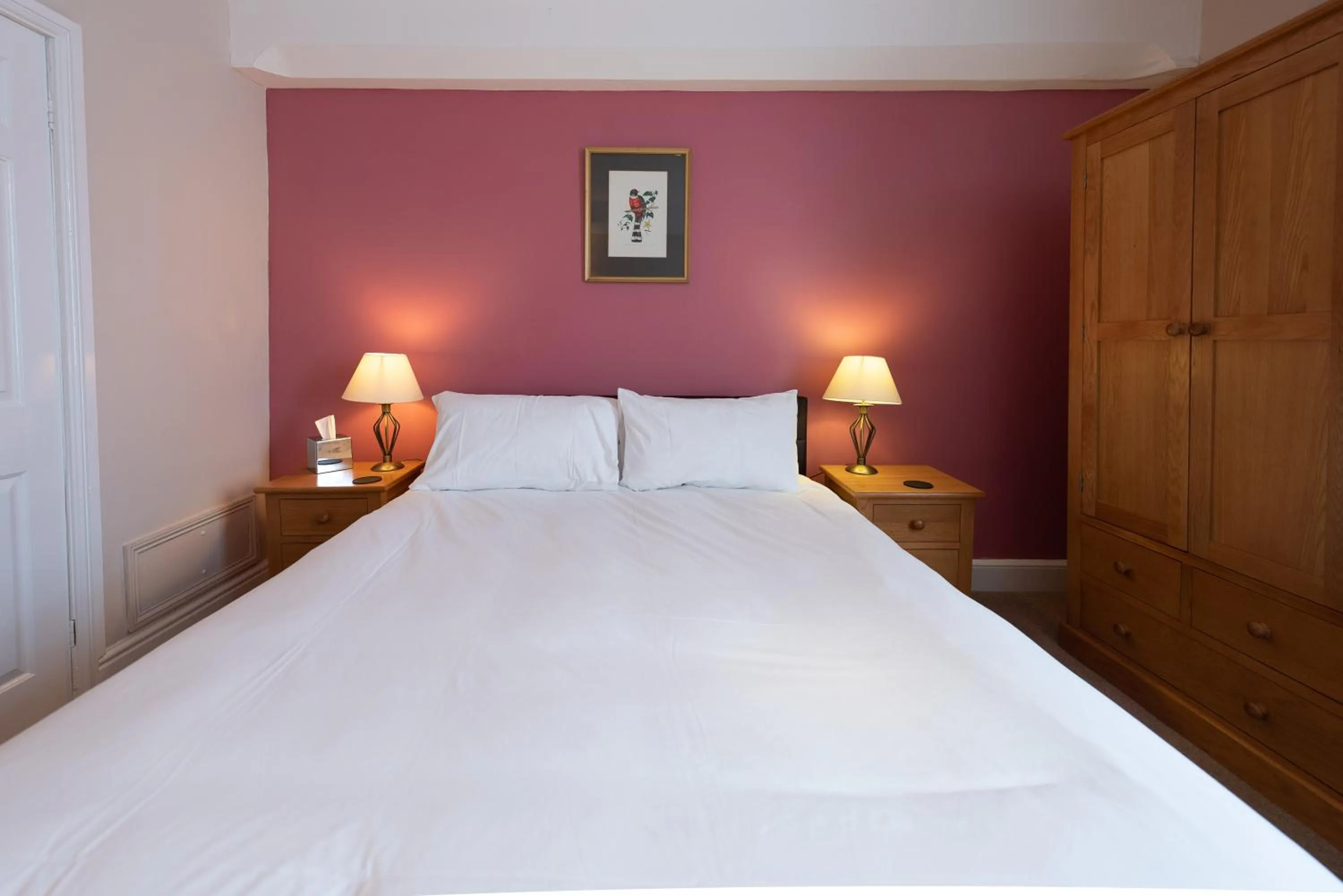 Bed in Corinium Hotel & Restaurant