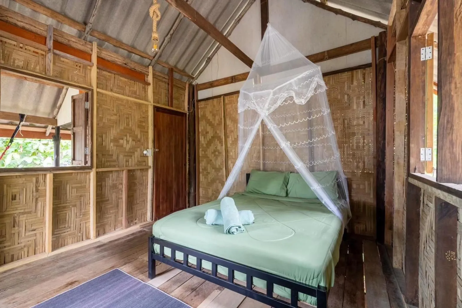 Bed in Koh Pu Sea View Beach Resort