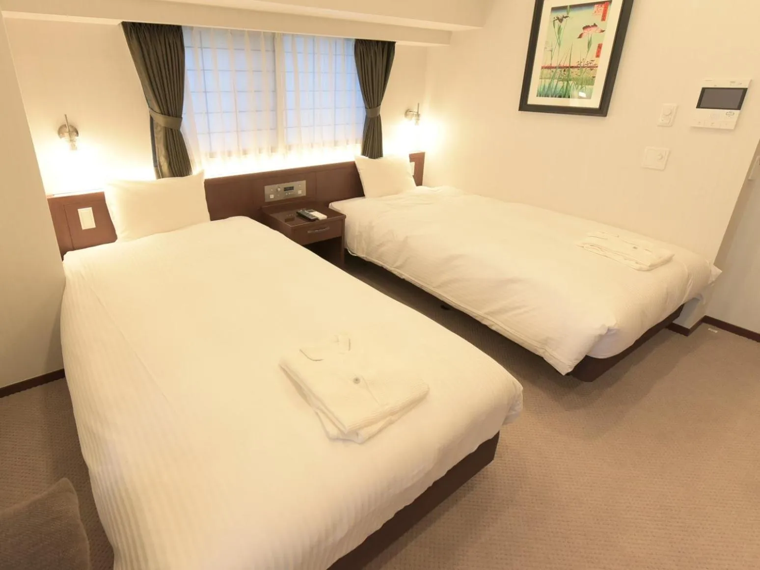 Bed in HOTEL BRILLIO ASAKUSABASHI