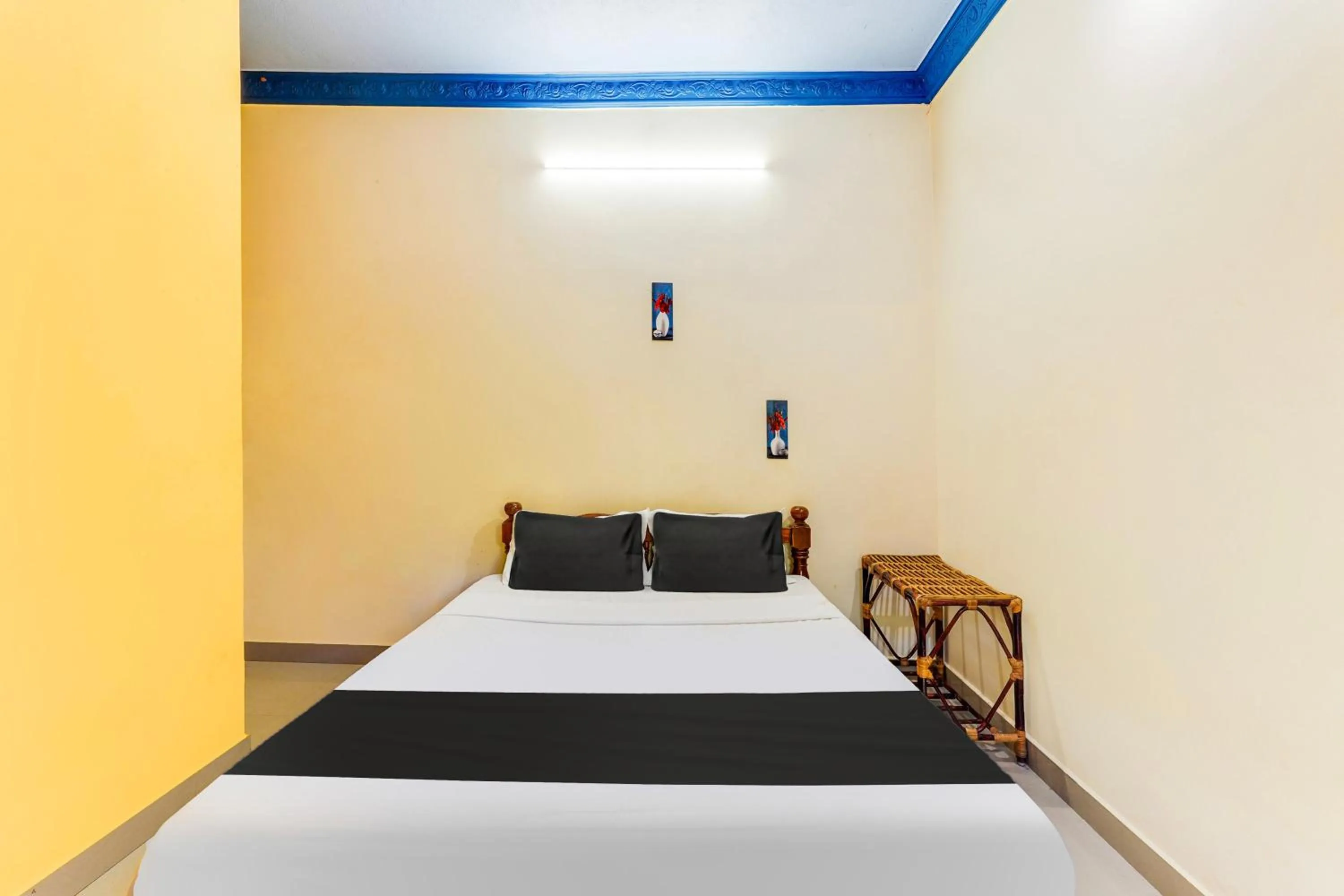 Bedroom, Bed in Hotel O Raghul Residency