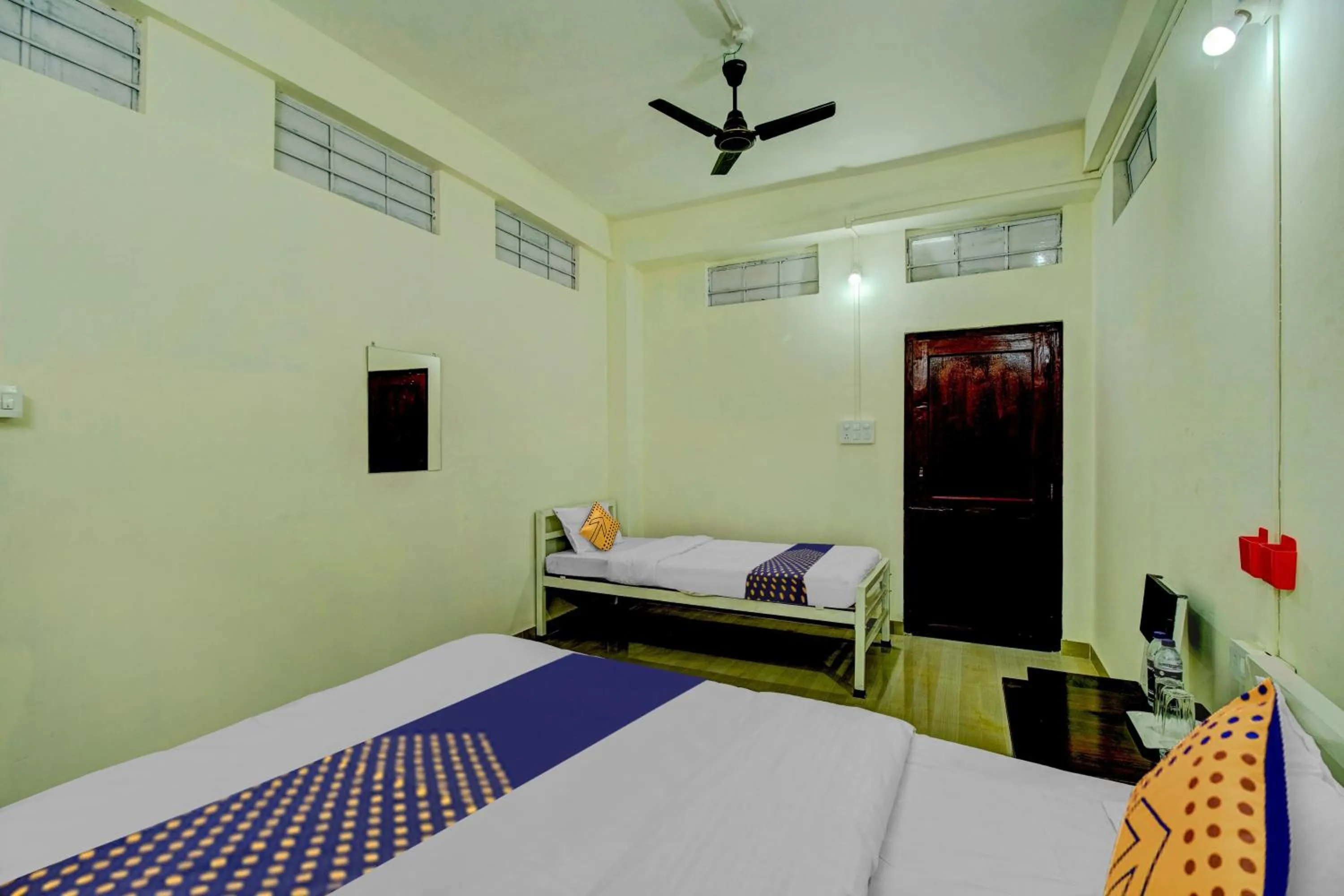 Bedroom, Bed in SPOT ON Rainbow Lodge