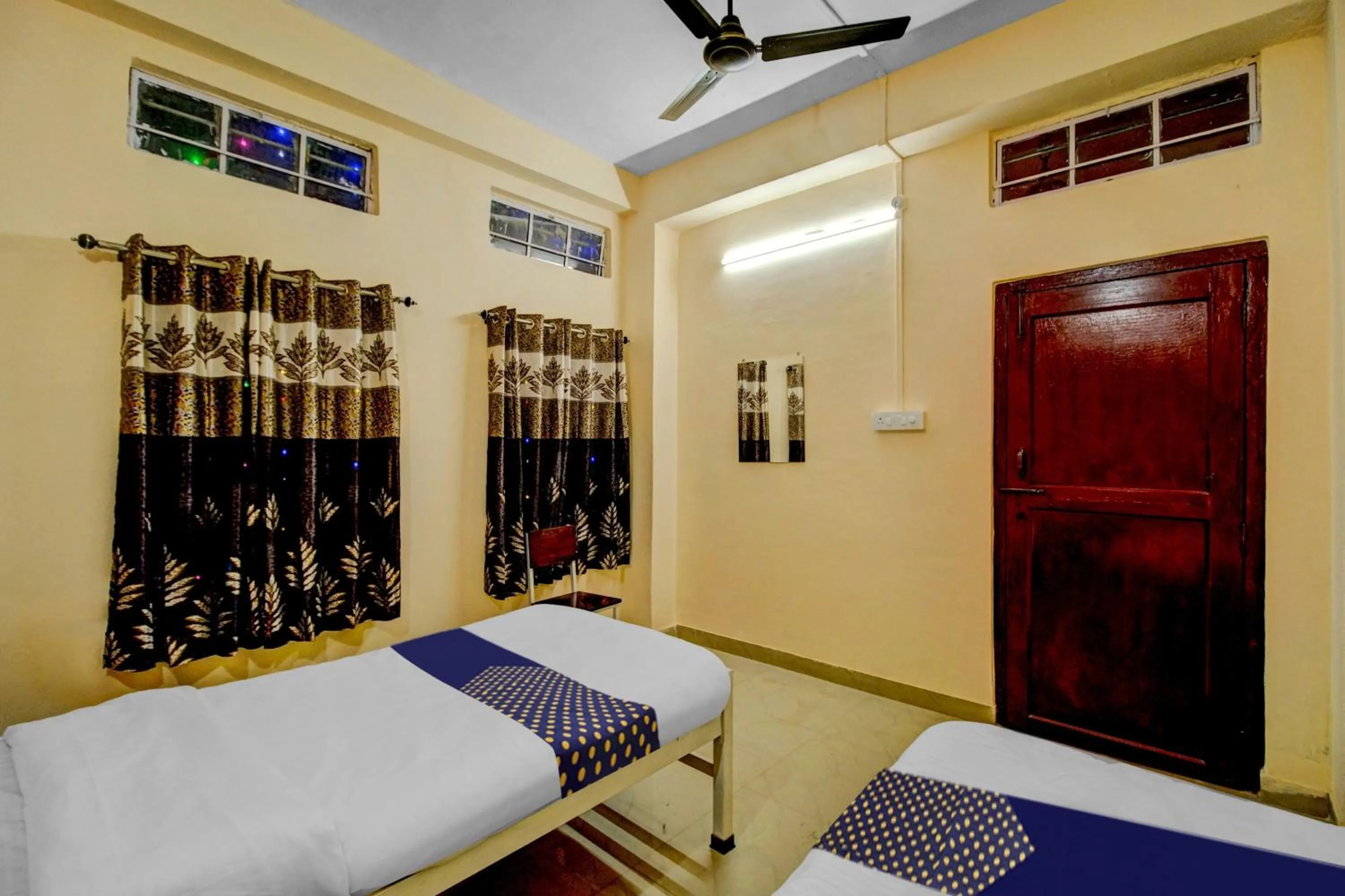 Bedroom, Bed in SPOT ON Rainbow Lodge