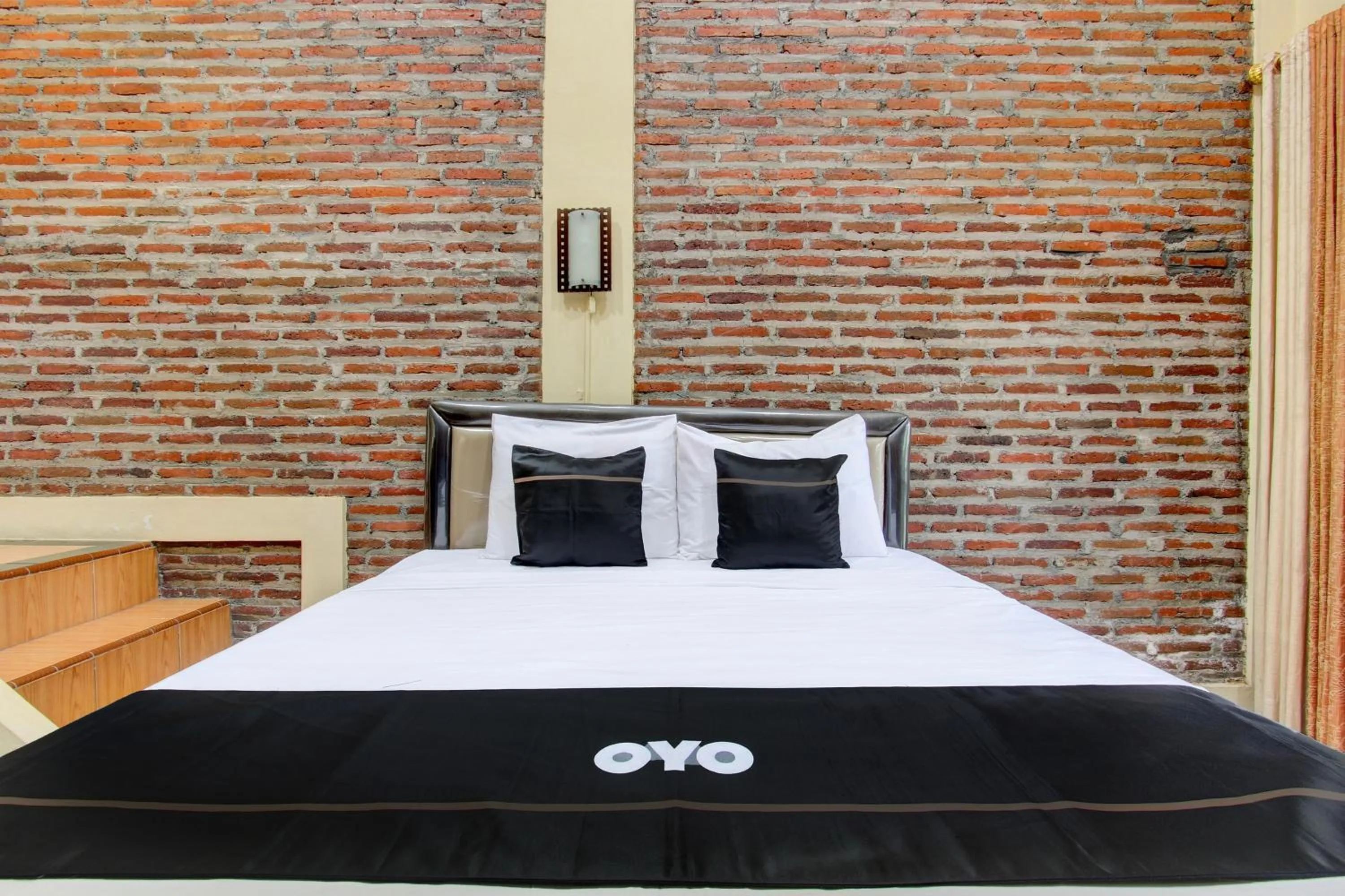 Bedroom in Capital O 93716 Family Guesthouse Syariah