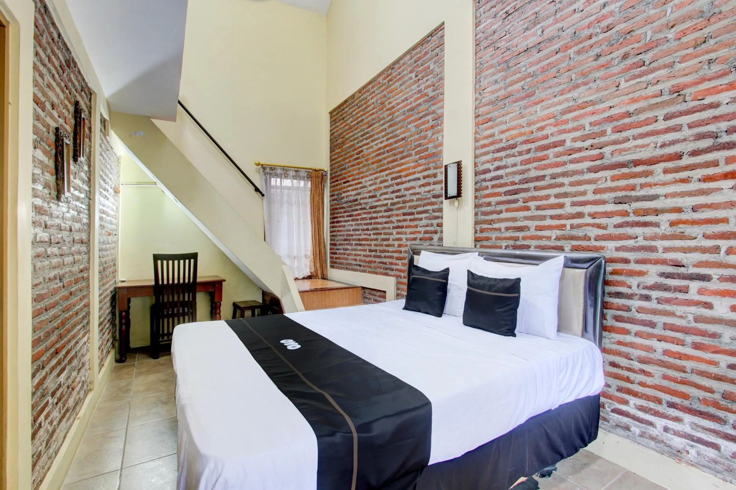 Bedroom in Capital O 93716 Family Guesthouse Syariah