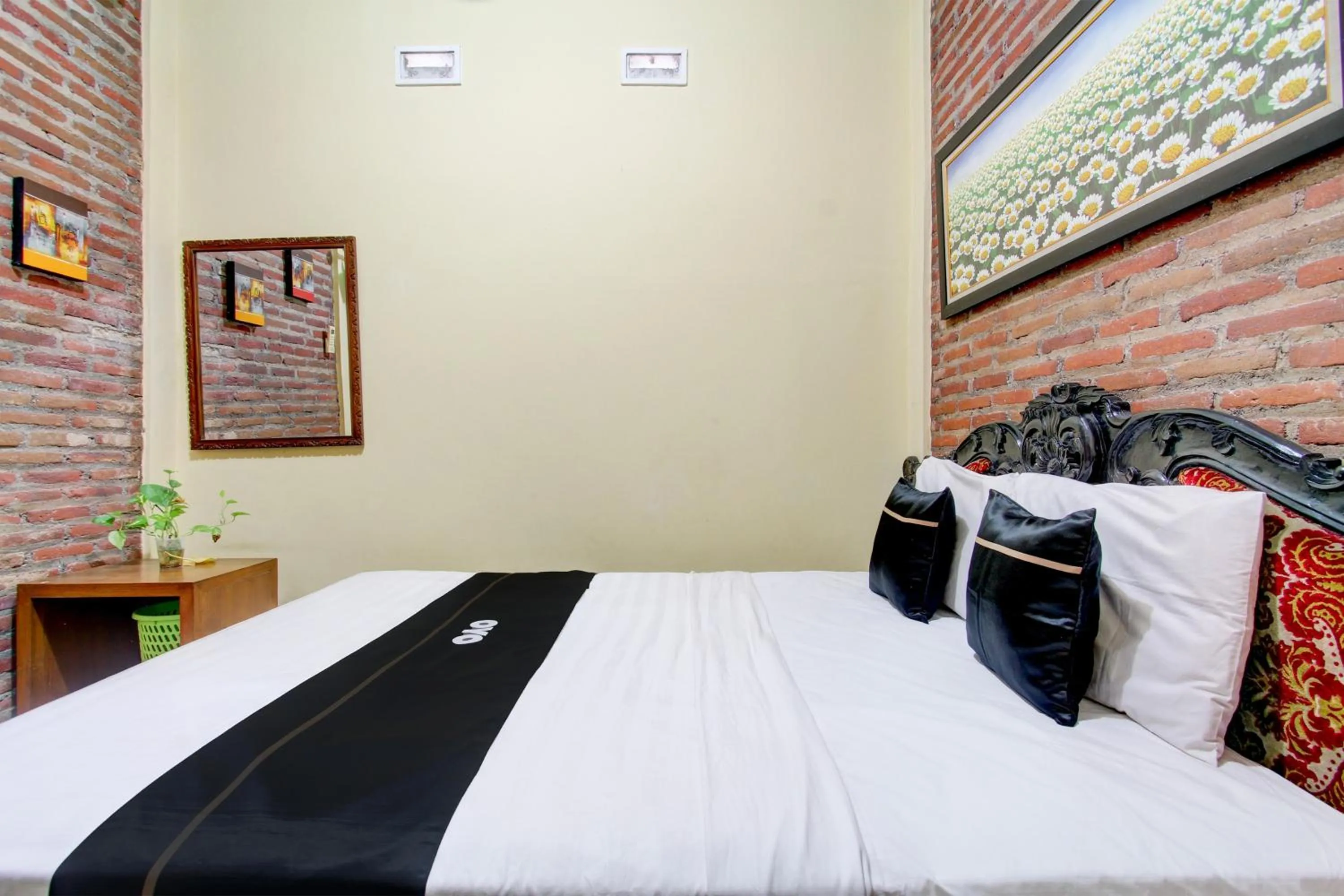 Bedroom in Capital O 93716 Family Guesthouse Syariah