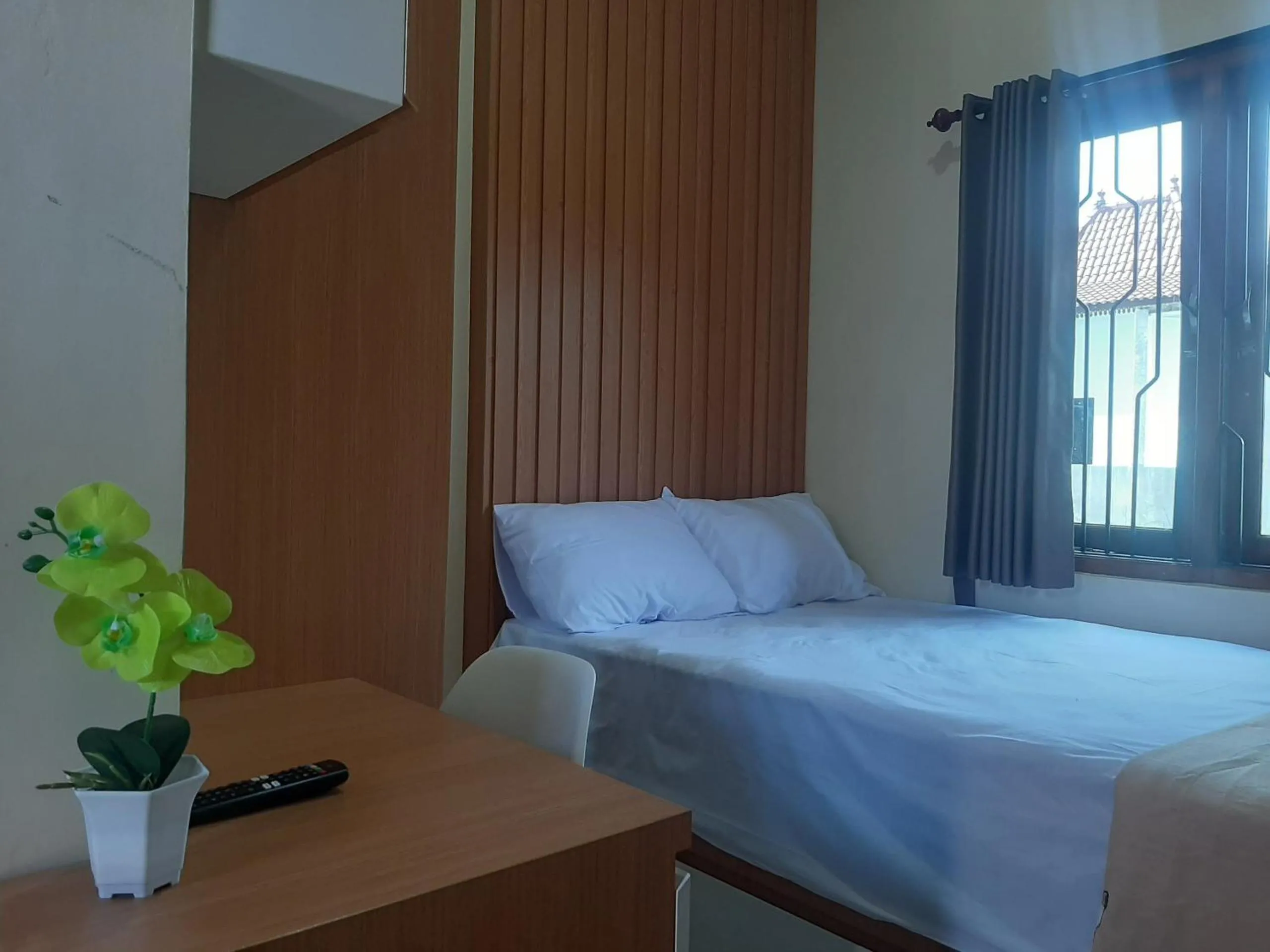 Bedroom in Capital O 93719 Homestay Omah Bidadari