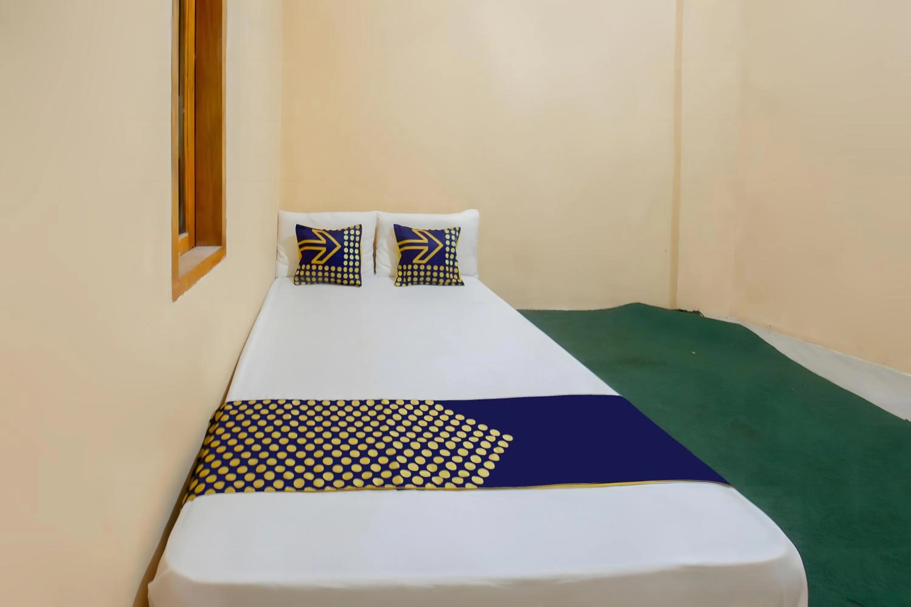 Bedroom, Bed in SPOT ON 93724 Songgong Homestay