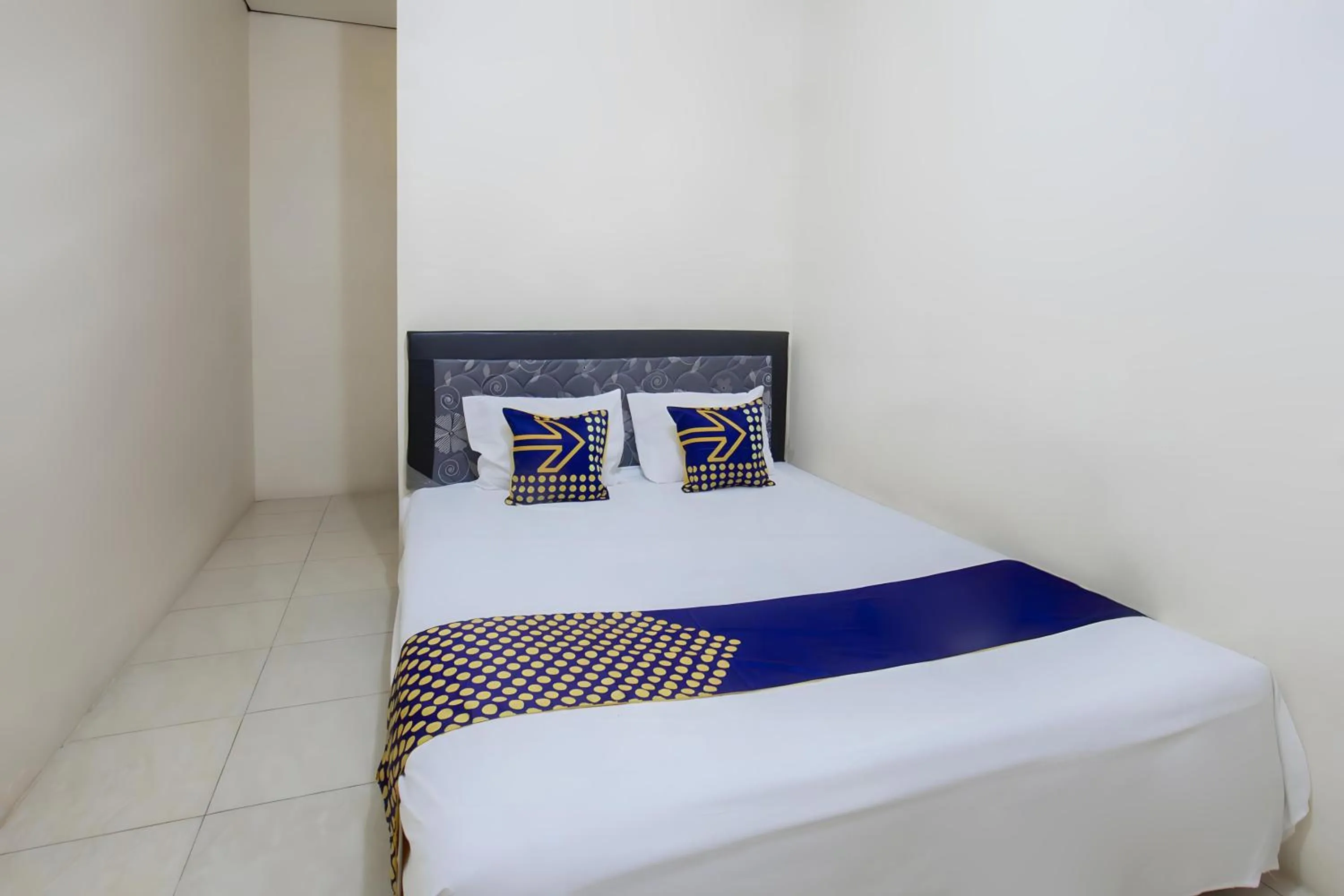 Bedroom, Bed in SPOT ON 93724 Songgong Homestay