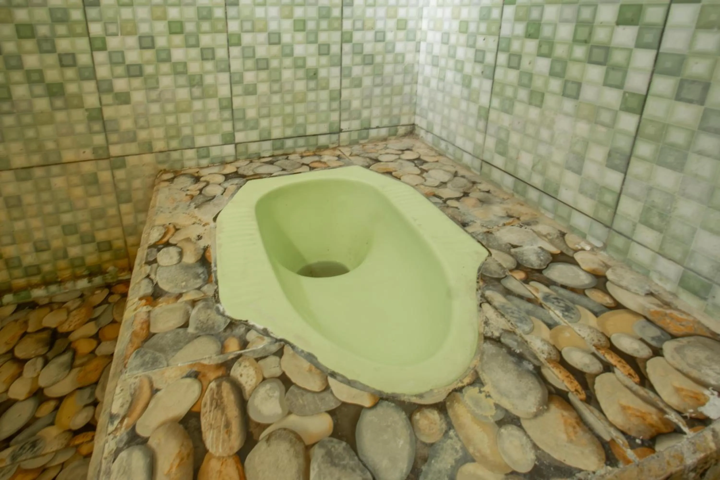 Bathroom in SPOT ON 93724 Songgong Homestay