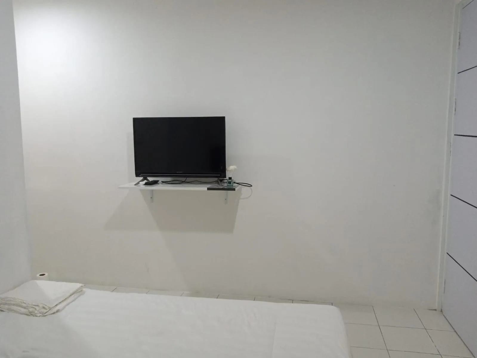 Bedroom in Capital O 93728 Guest House Cemara