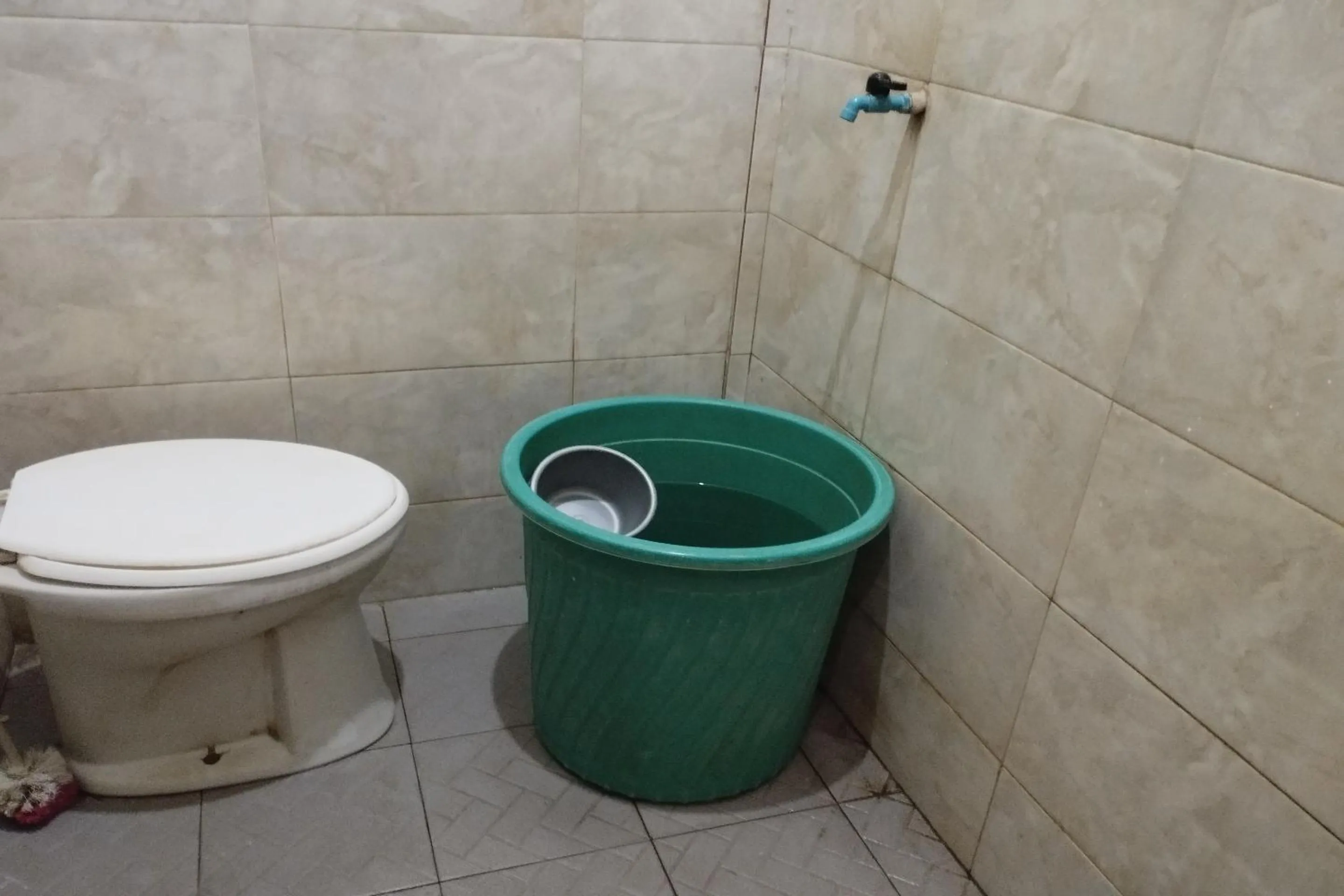 Bathroom in Hotel O Madame Guesthouse