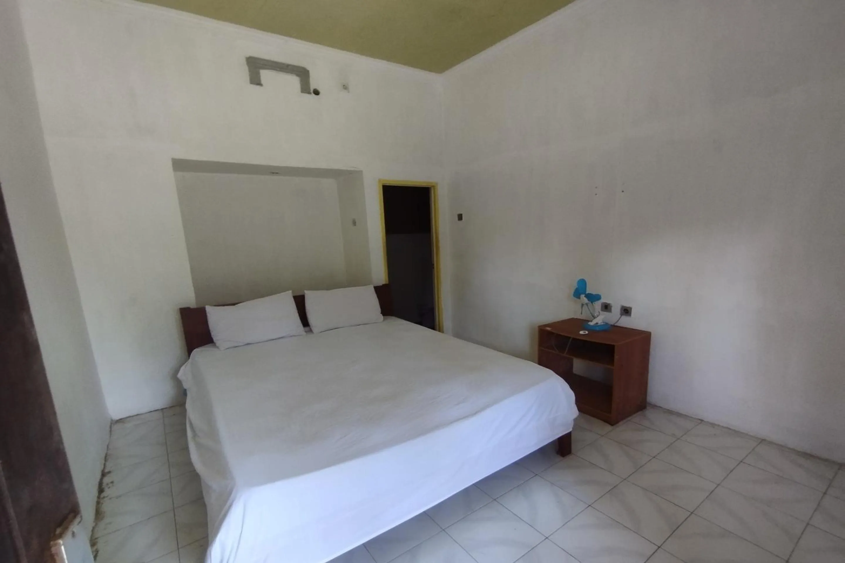 Bedroom, Bed in Hotel O Madame Guesthouse