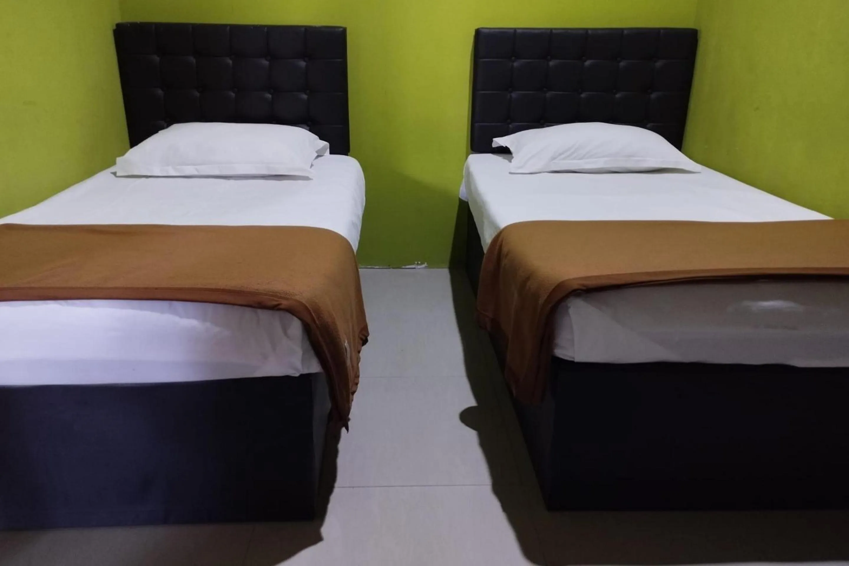 Bedroom, Bed in Hotel O Homestay Citra