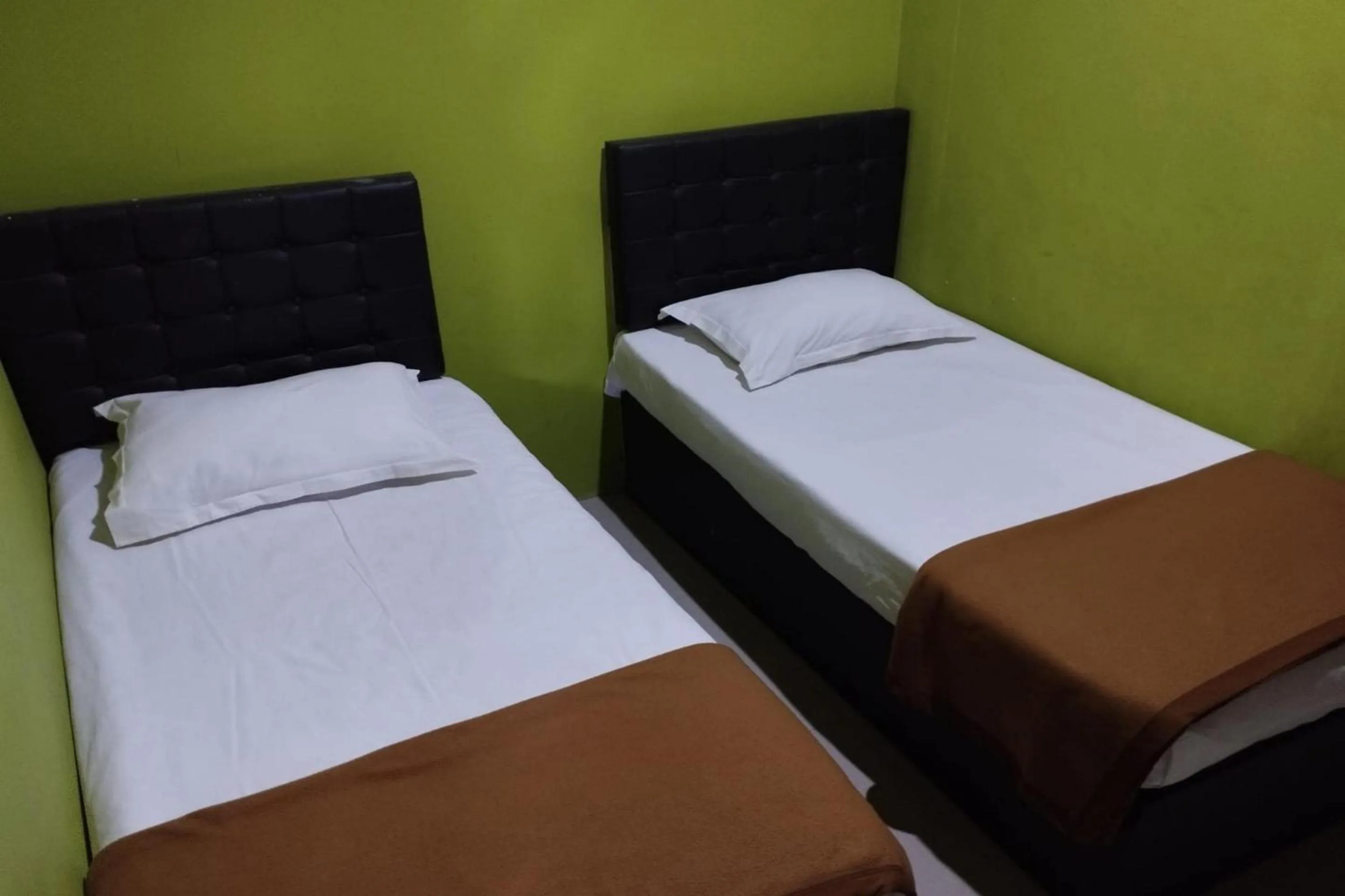 Bedroom, Bed in Hotel O Homestay Citra