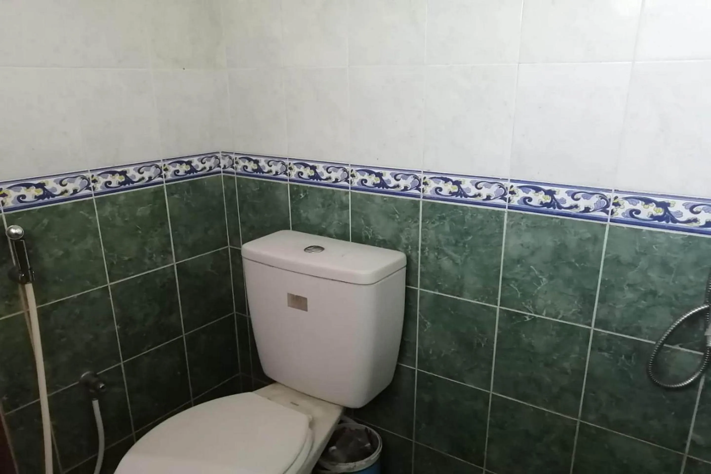 Bathroom in Hotel O Homestay Citra