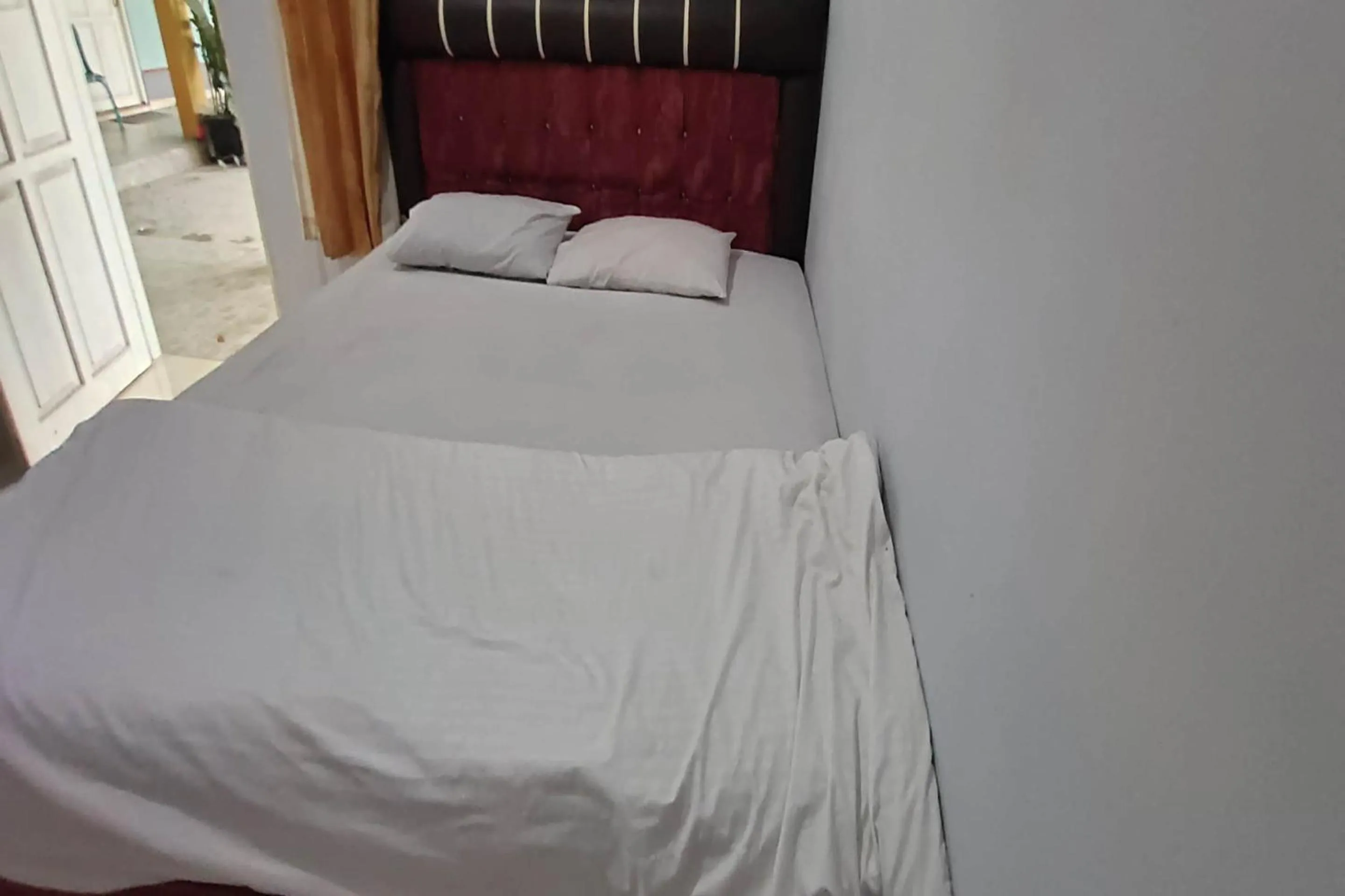 Bedroom, Bed in Hotel O Homestay Citra