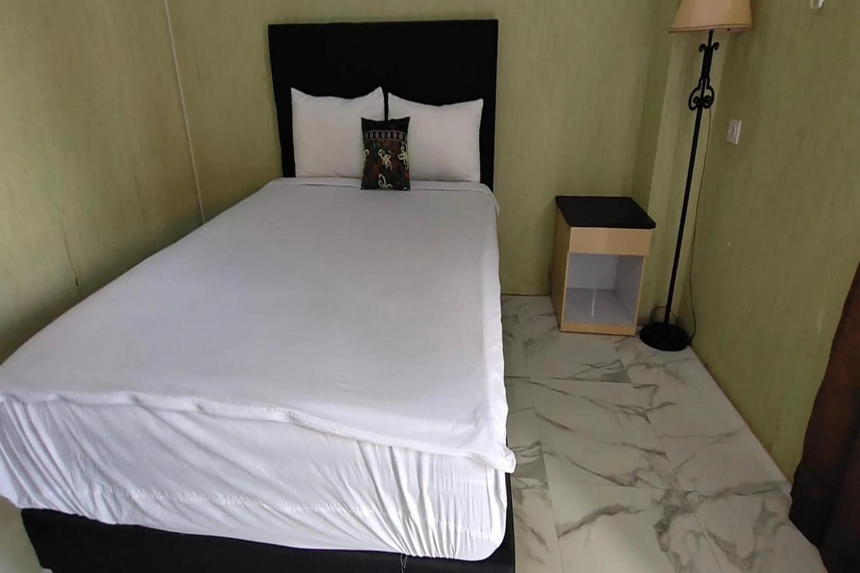 Bedroom, Bed in Hotel O Homestay Citra