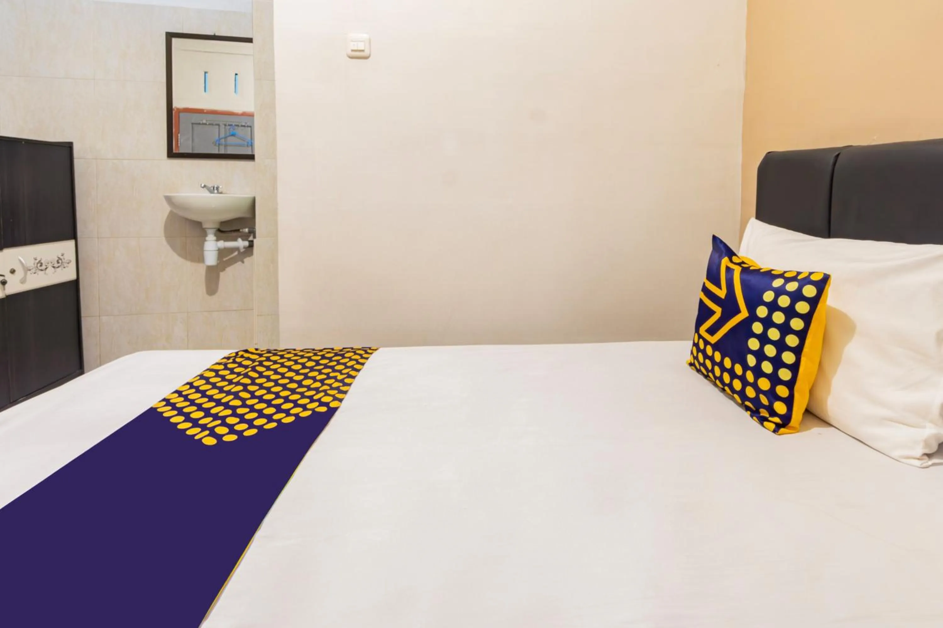 Bedroom, Bed in Hotel O Siwalanpanji Homestay Syariah