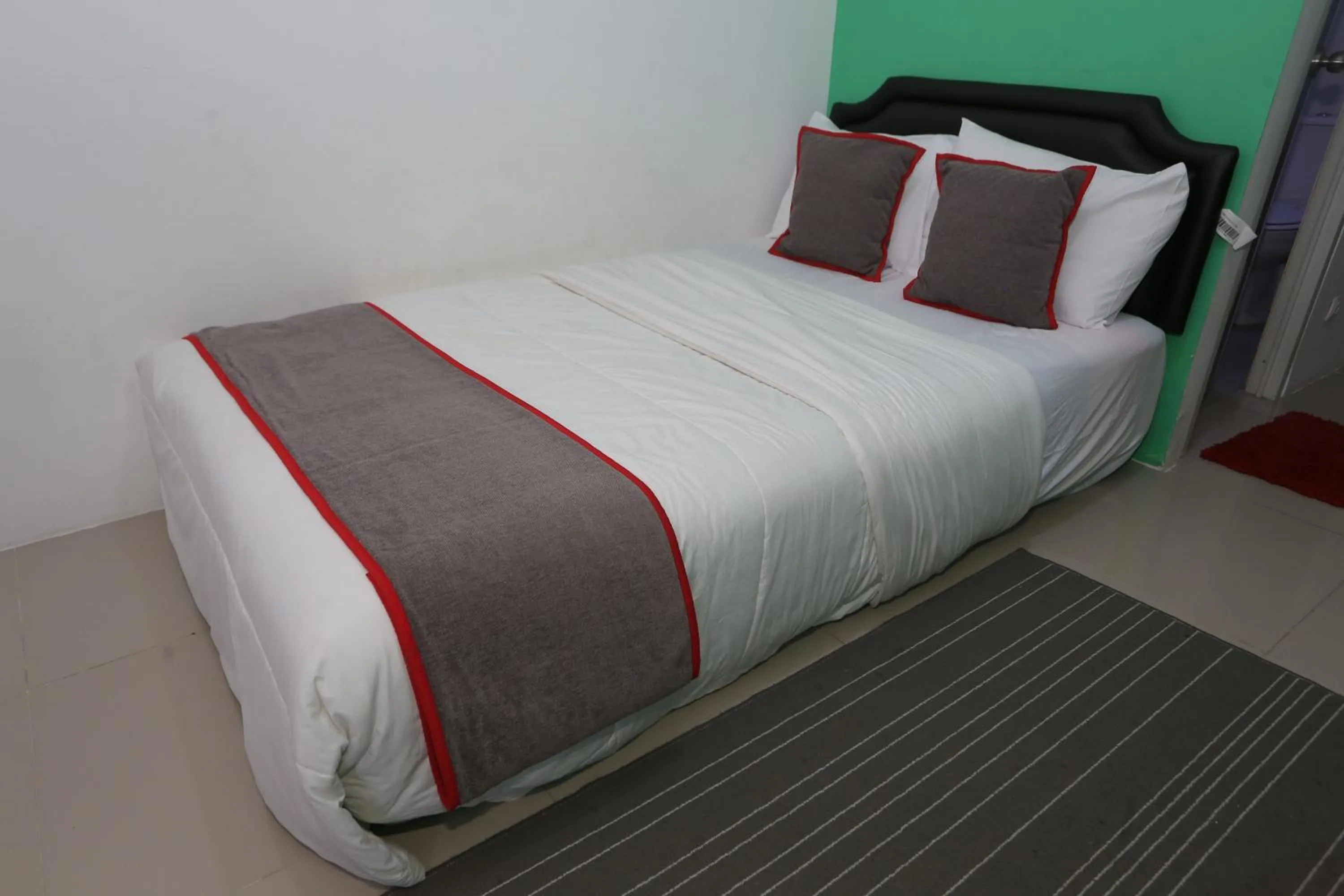 Bedroom in Collection O 93750 Luxury Rooms @ Urbantown Serpong
