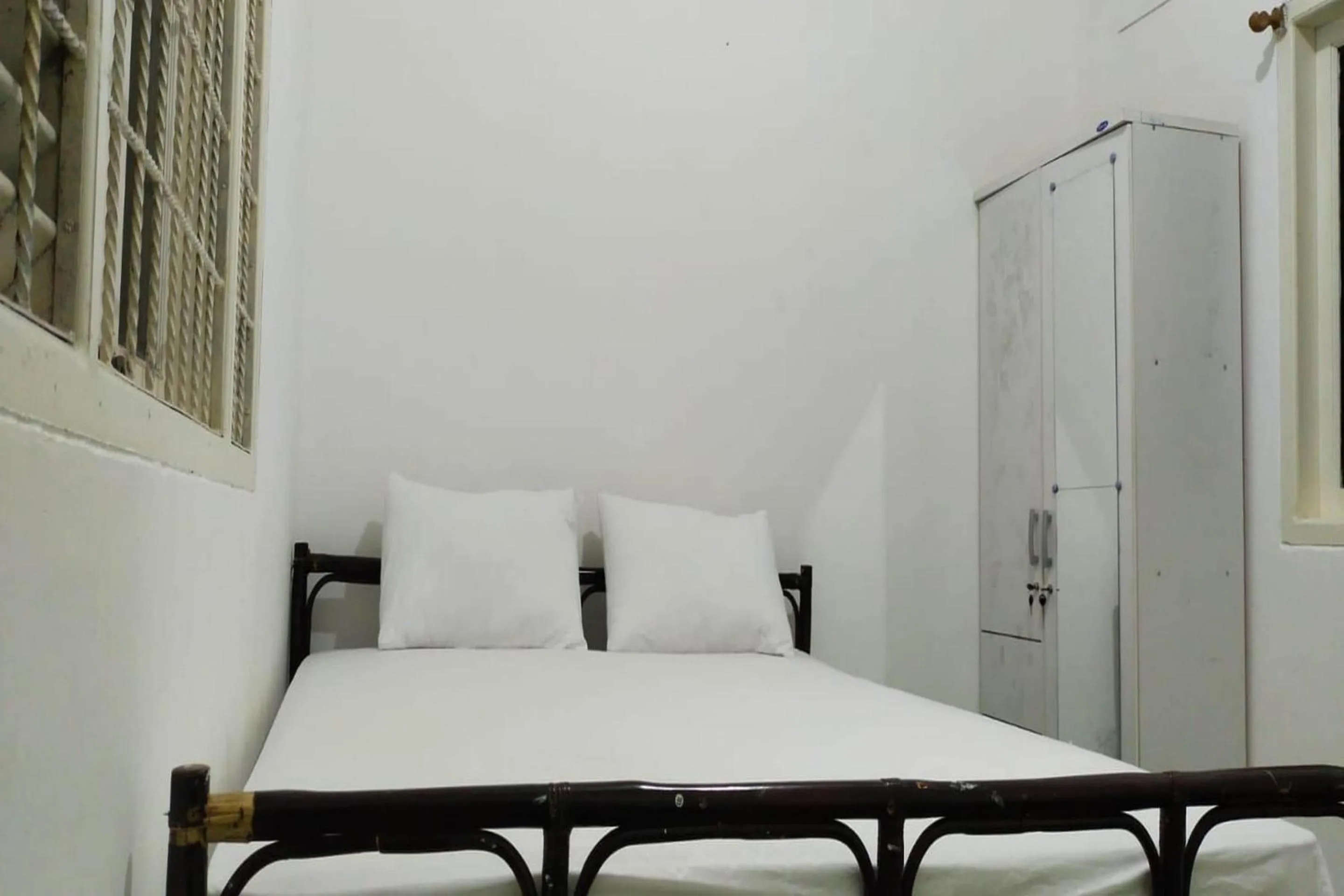 Bedroom, Bed in OYO 93774 Khaira Kos Dan PenginapanNearYani Heahlerr