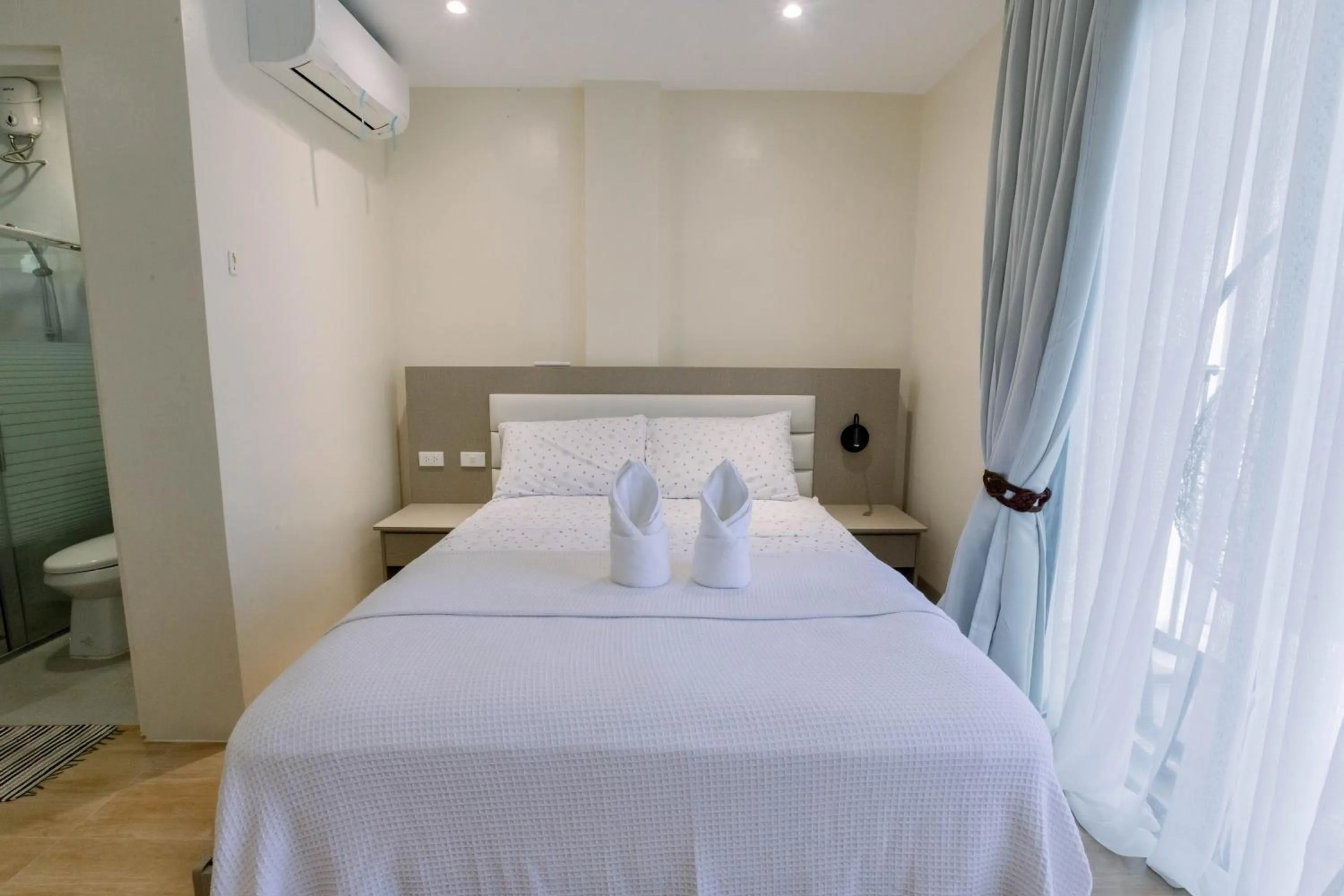 Bed in Sonrisa Resort De Playa by Hiverooms