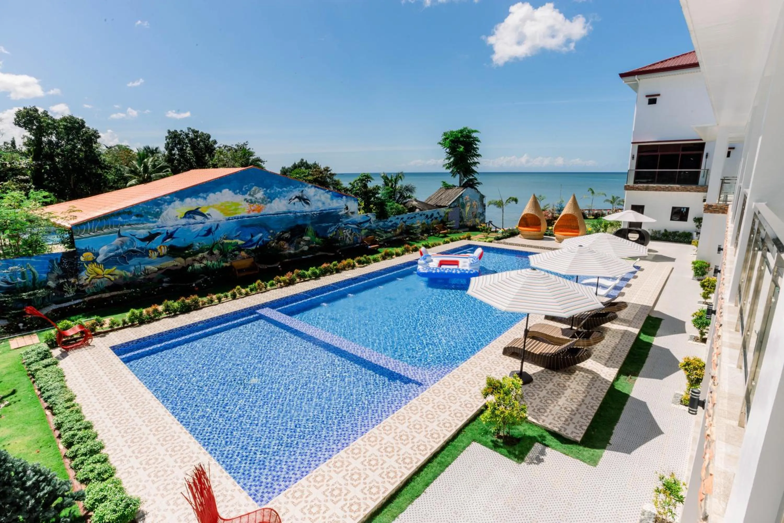 Pool view in Sonrisa Resort De Playa by Hiverooms