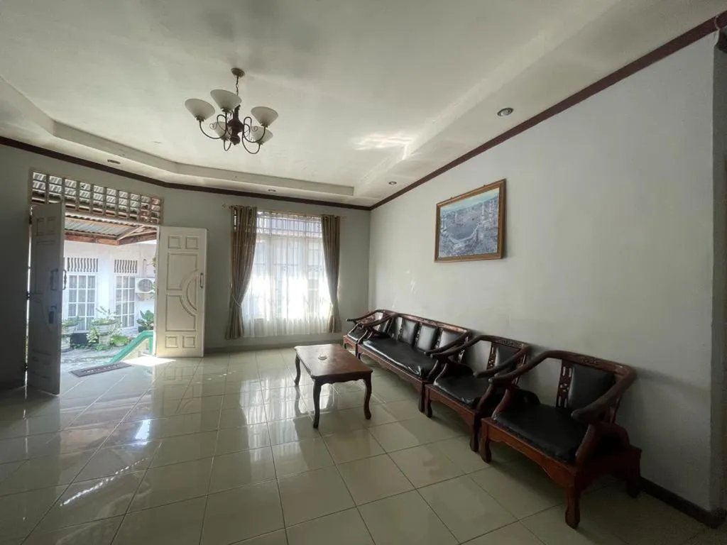 Lobby or reception in Hotel O Aksana Homestay SyariahNearWonderland Trik Art