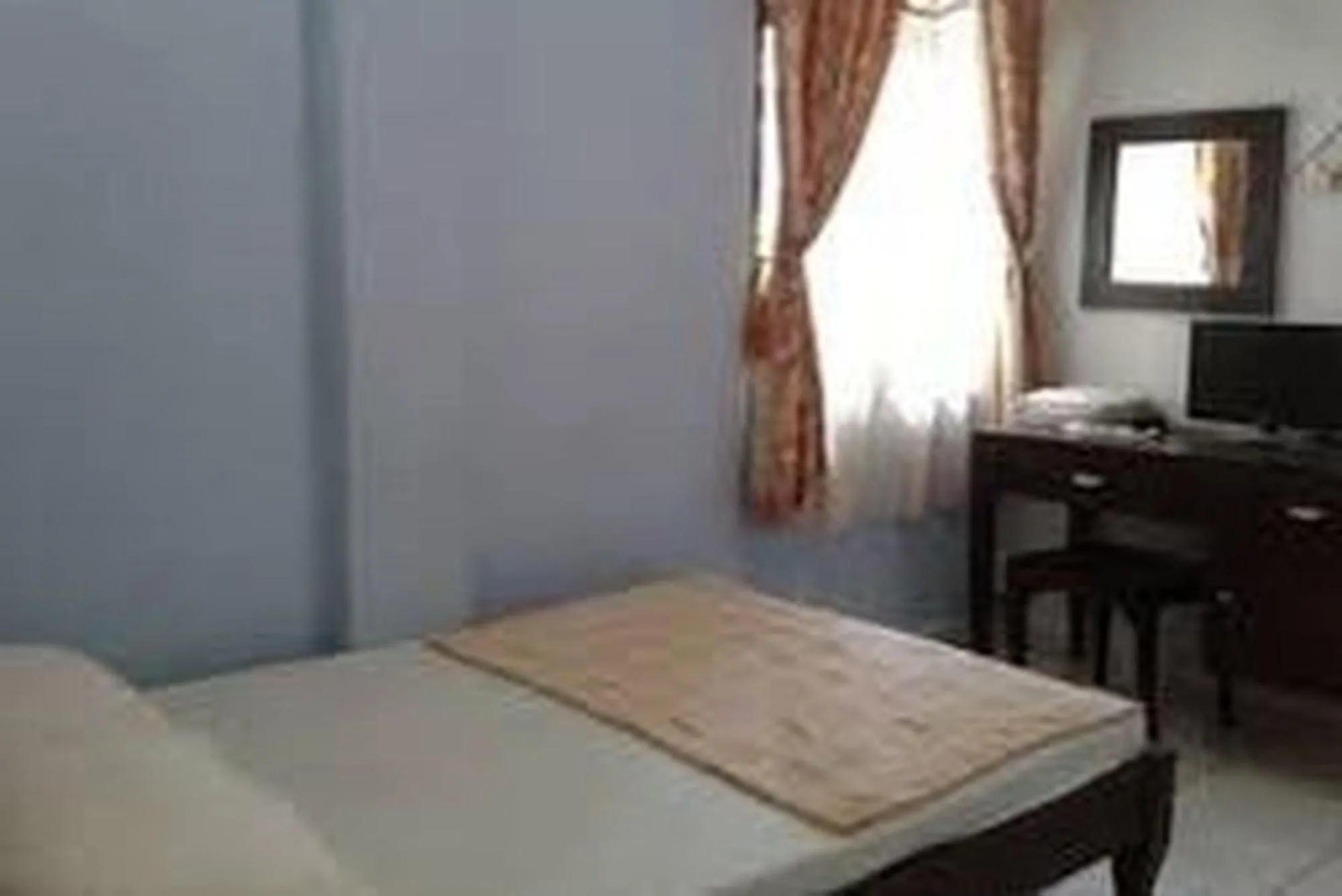Photo of the whole room, Bed in Hotel O Aksana Homestay SyariahNearWonderland Trik Art