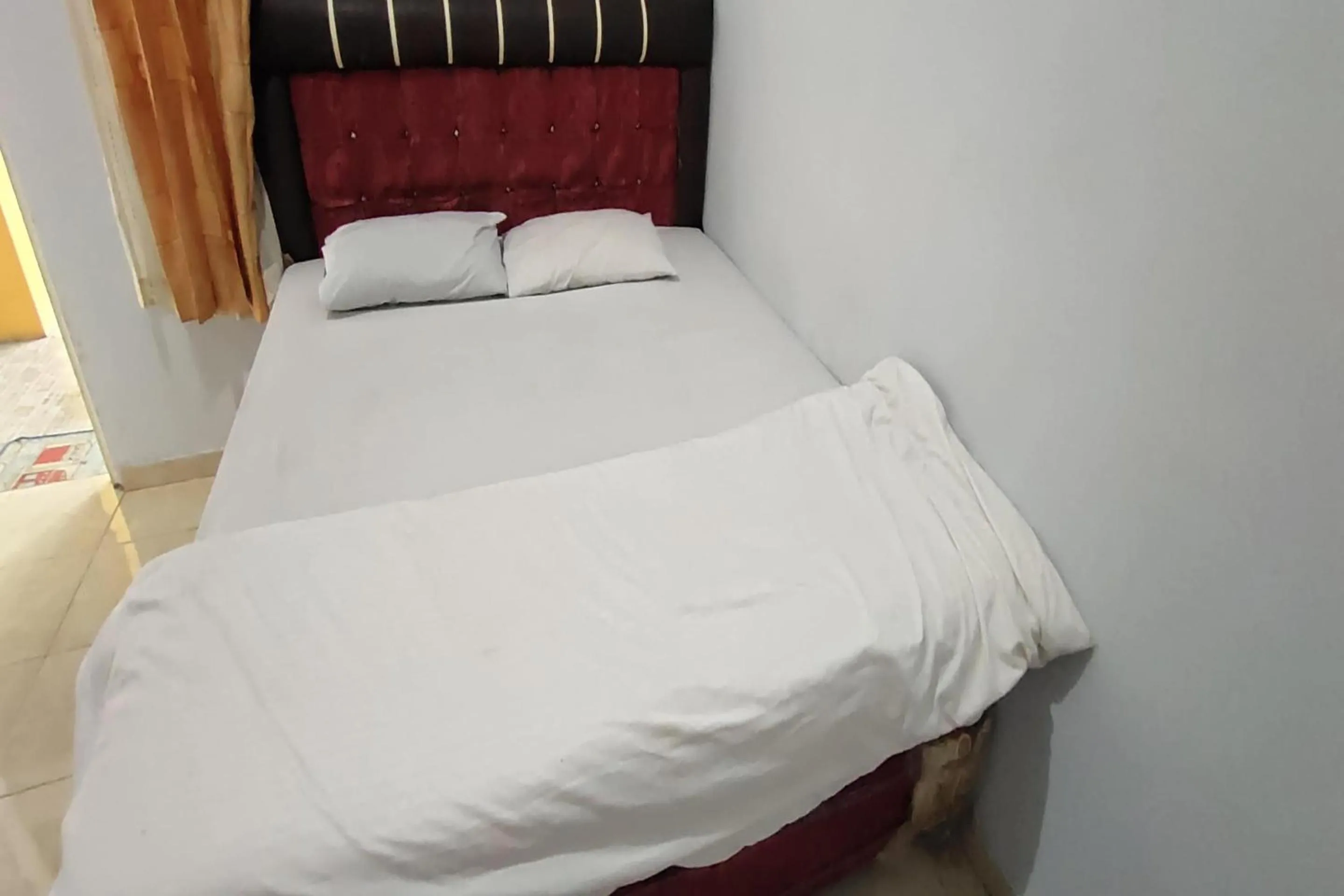 Bedroom, Bed in Hotel O Penginapan Naya Rita