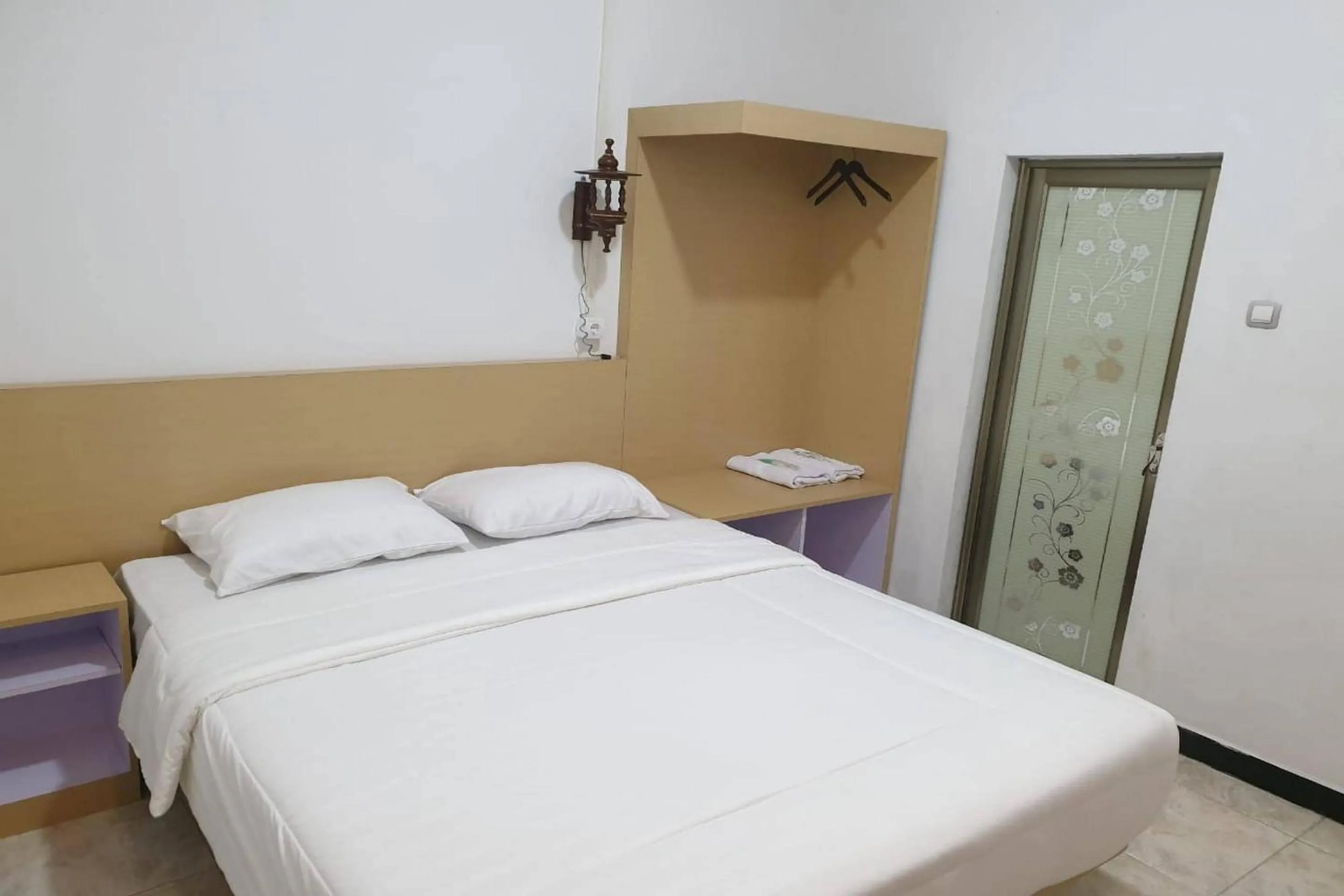 Bedroom, Bed in Hotel O Penginapan Naya Rita