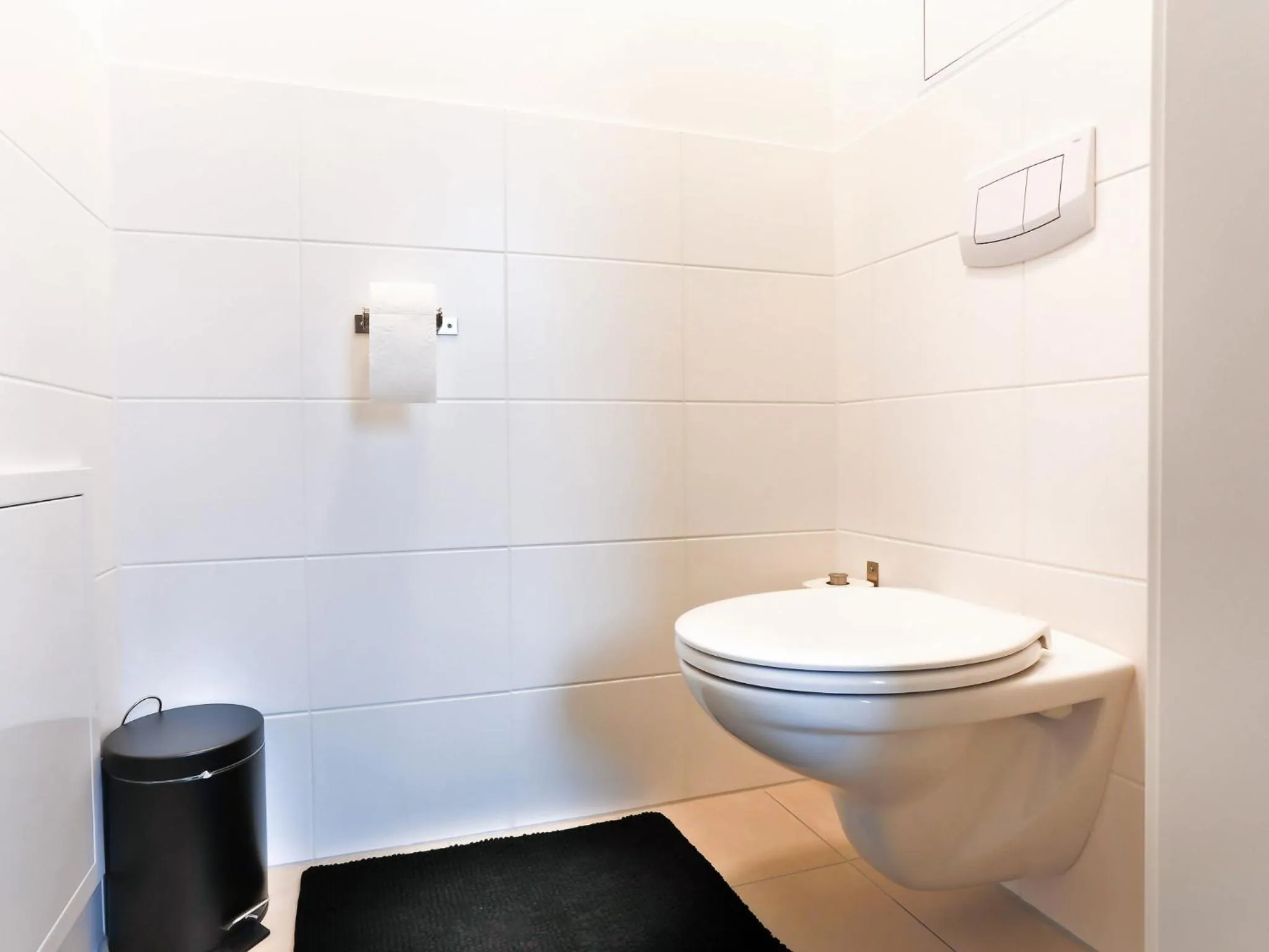 Toilet in Penthouse Apartments