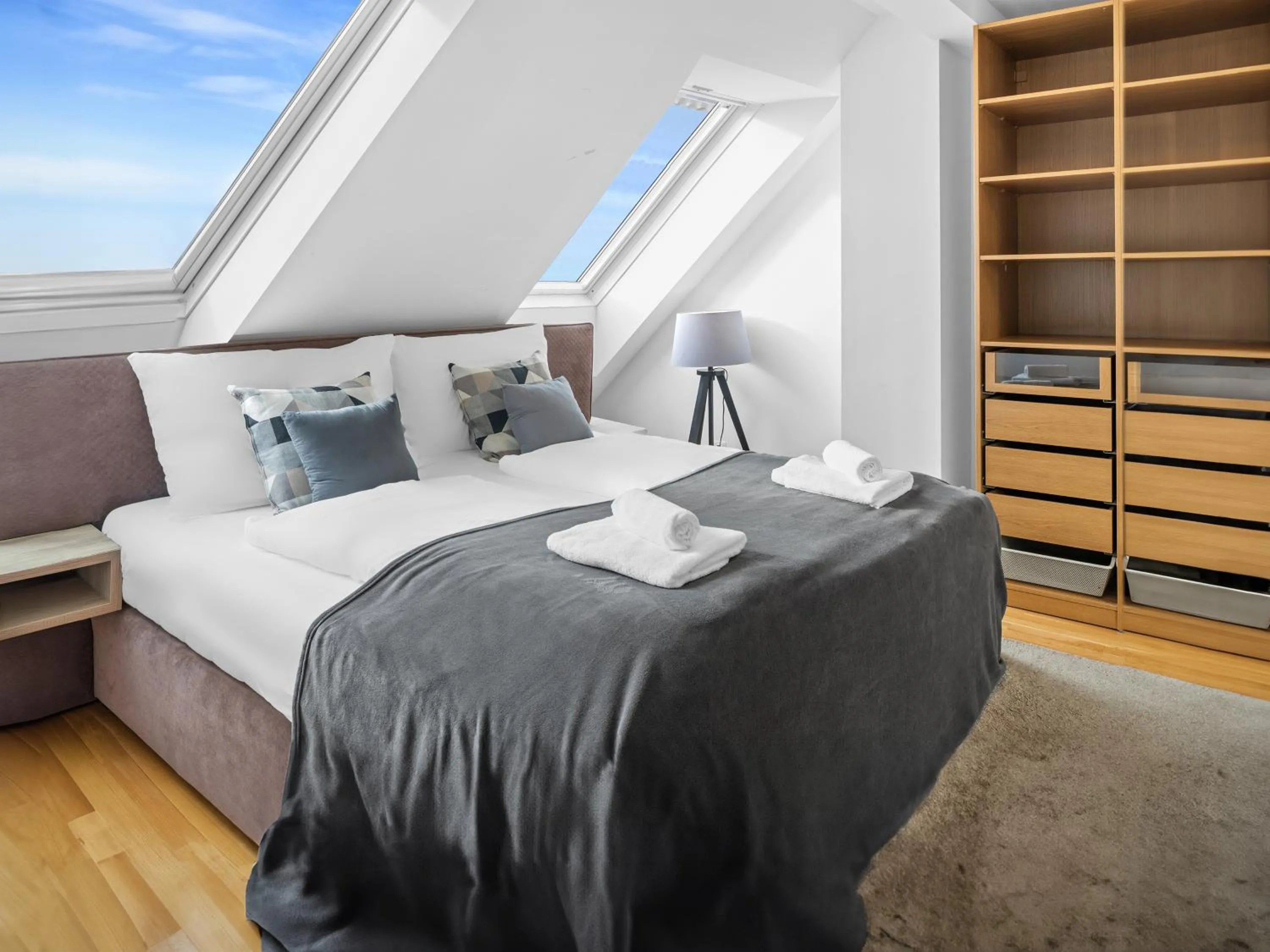 Bed in Penthouse Apartments