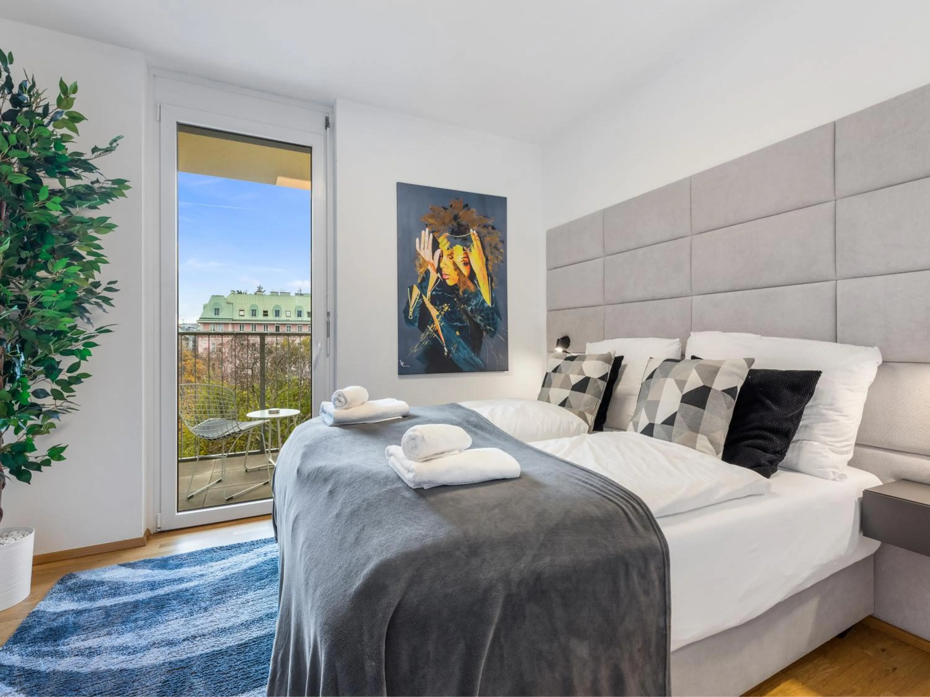 Bed in Penthouse Apartments