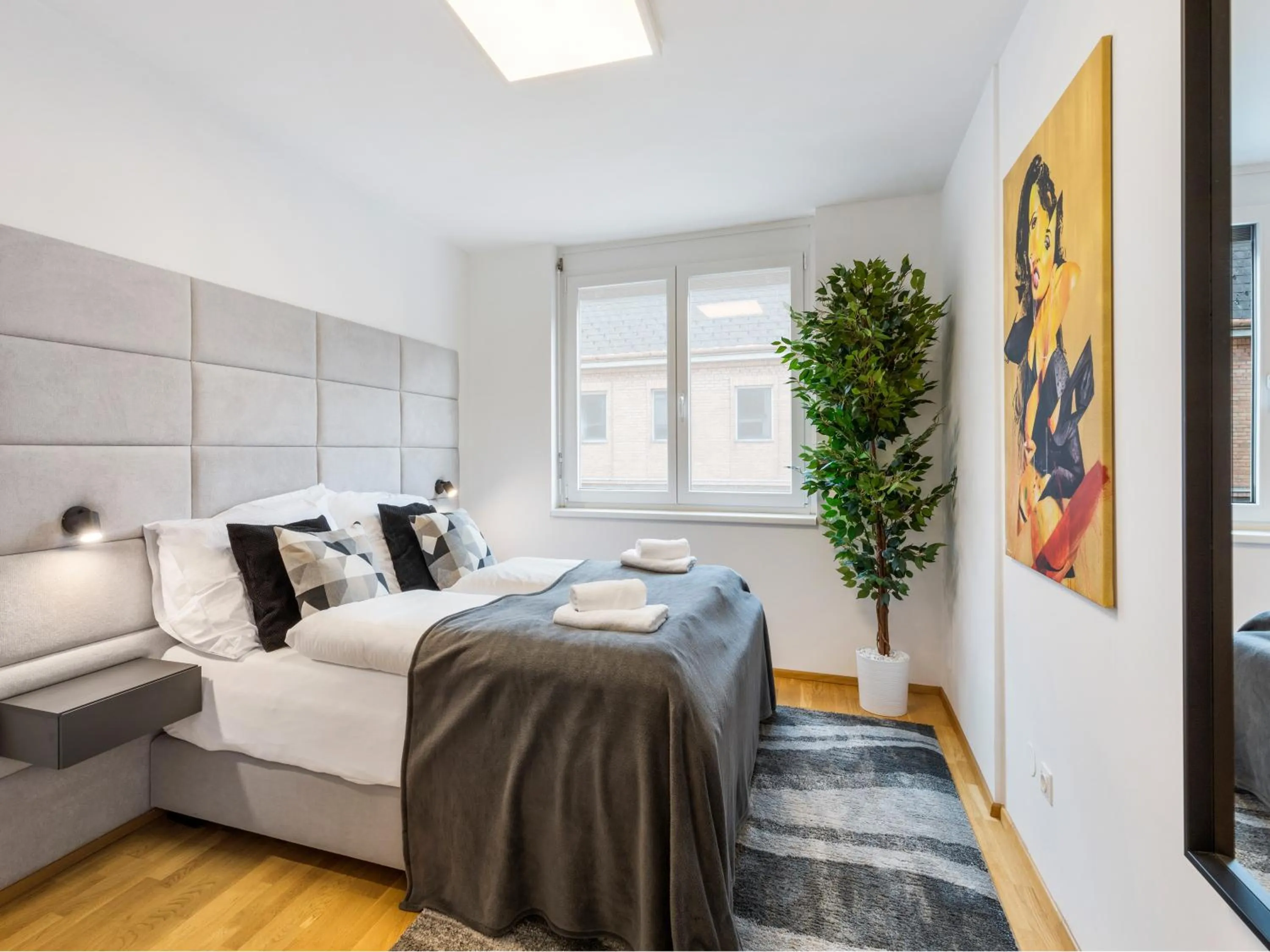 Bed in Penthouse Apartments