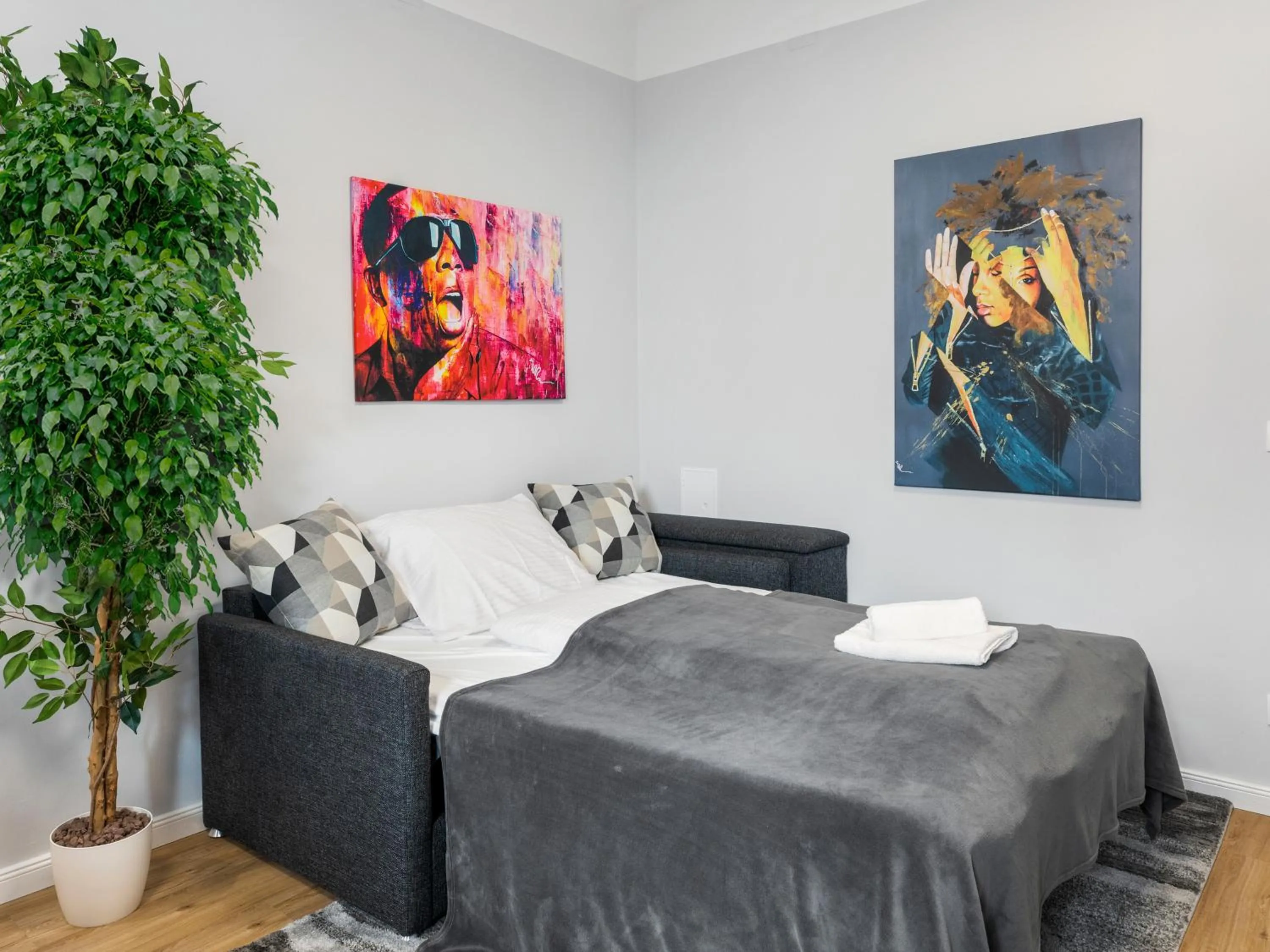 Living room, Bed in Penthouse Apartments