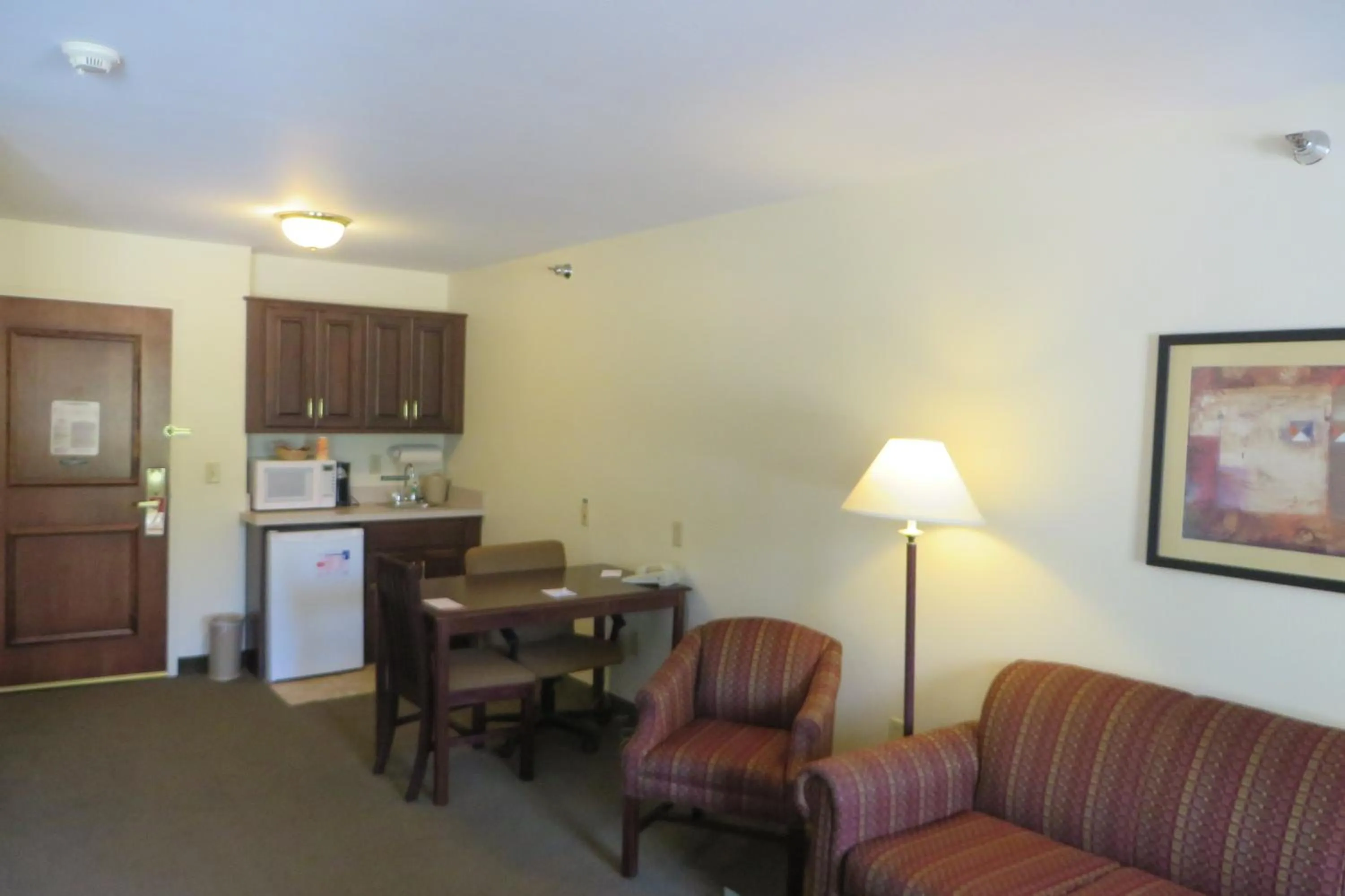 Living room in Hawthorn Extended Stay by Wyndham Seville