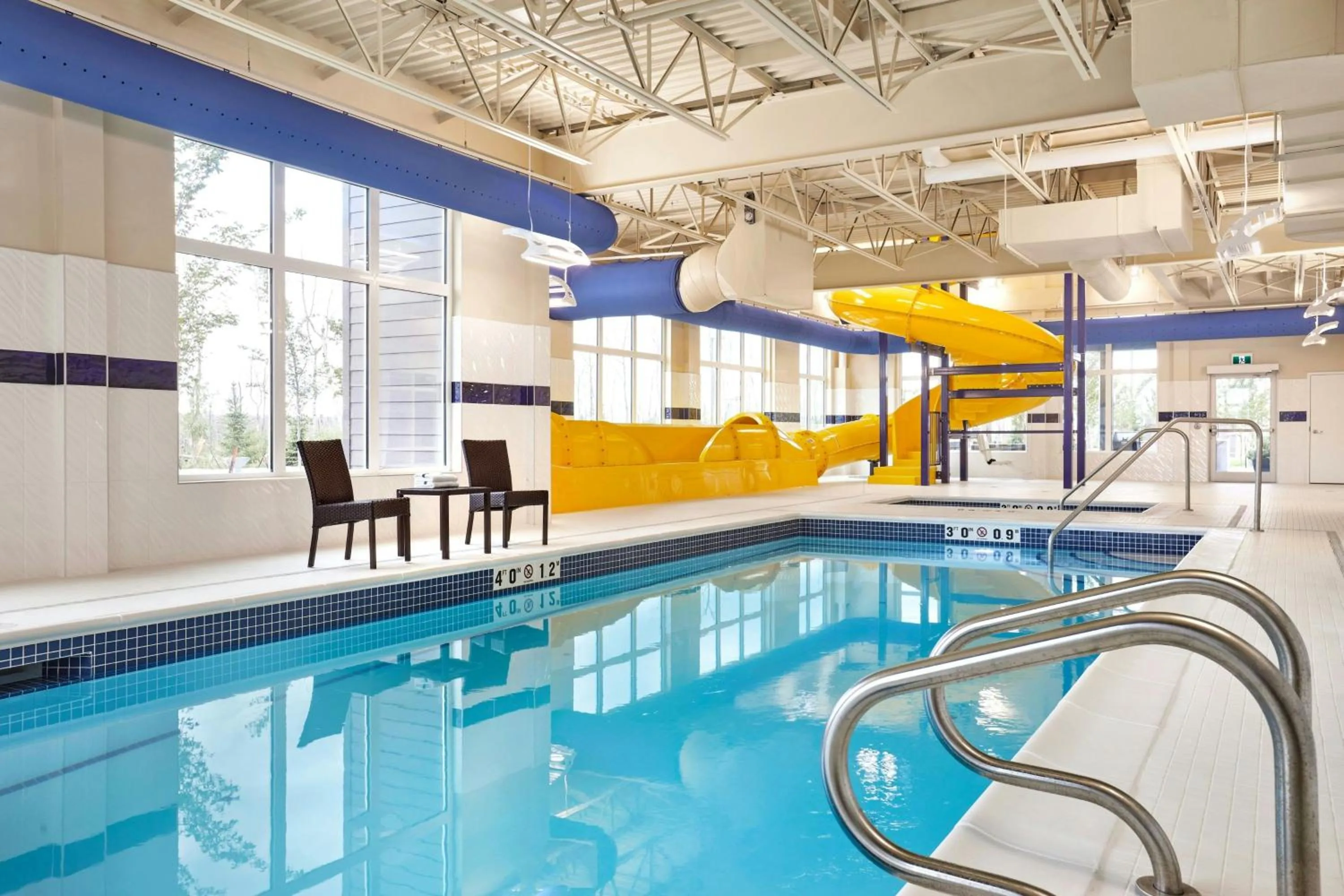 Swimming pool in TownePlace Suites by Marriott Fort McMurray