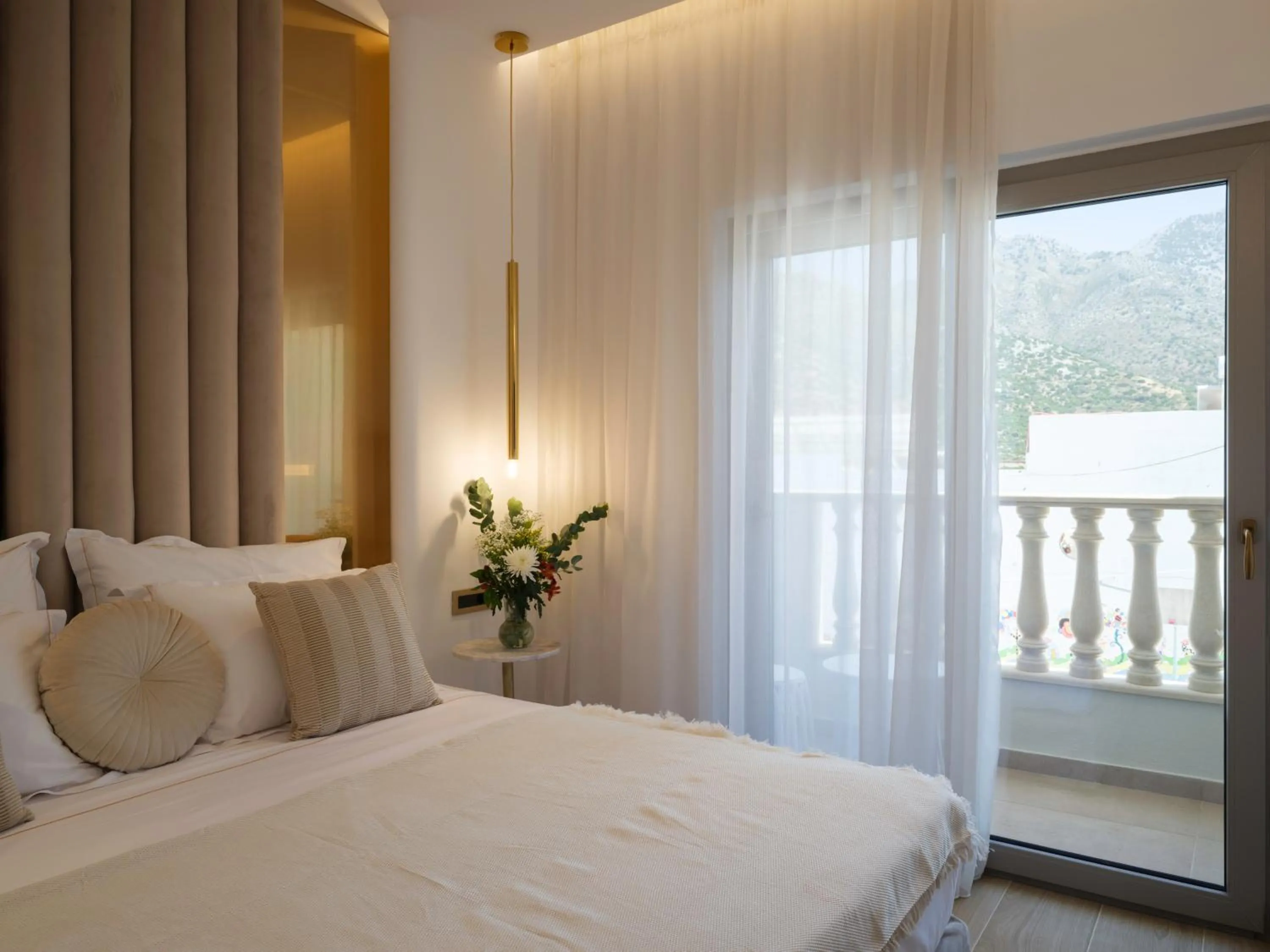 Bed in Golden Luxury Suites