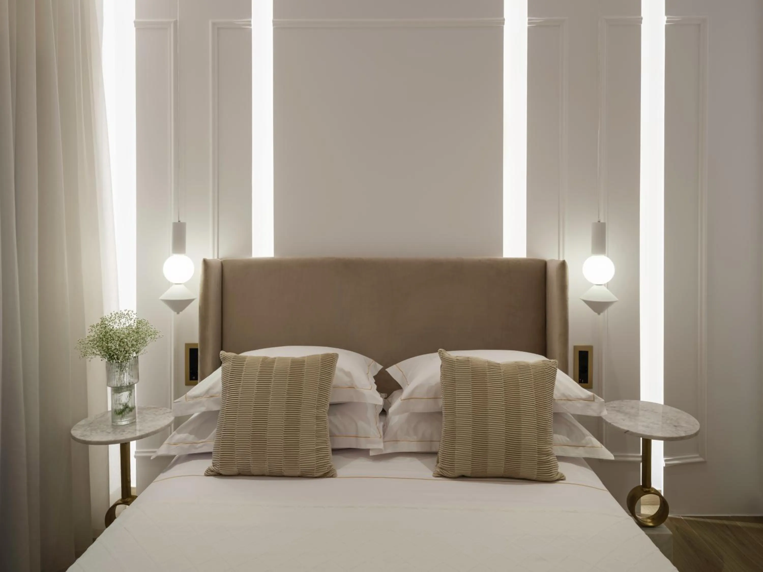 Bed in Golden Luxury Suites