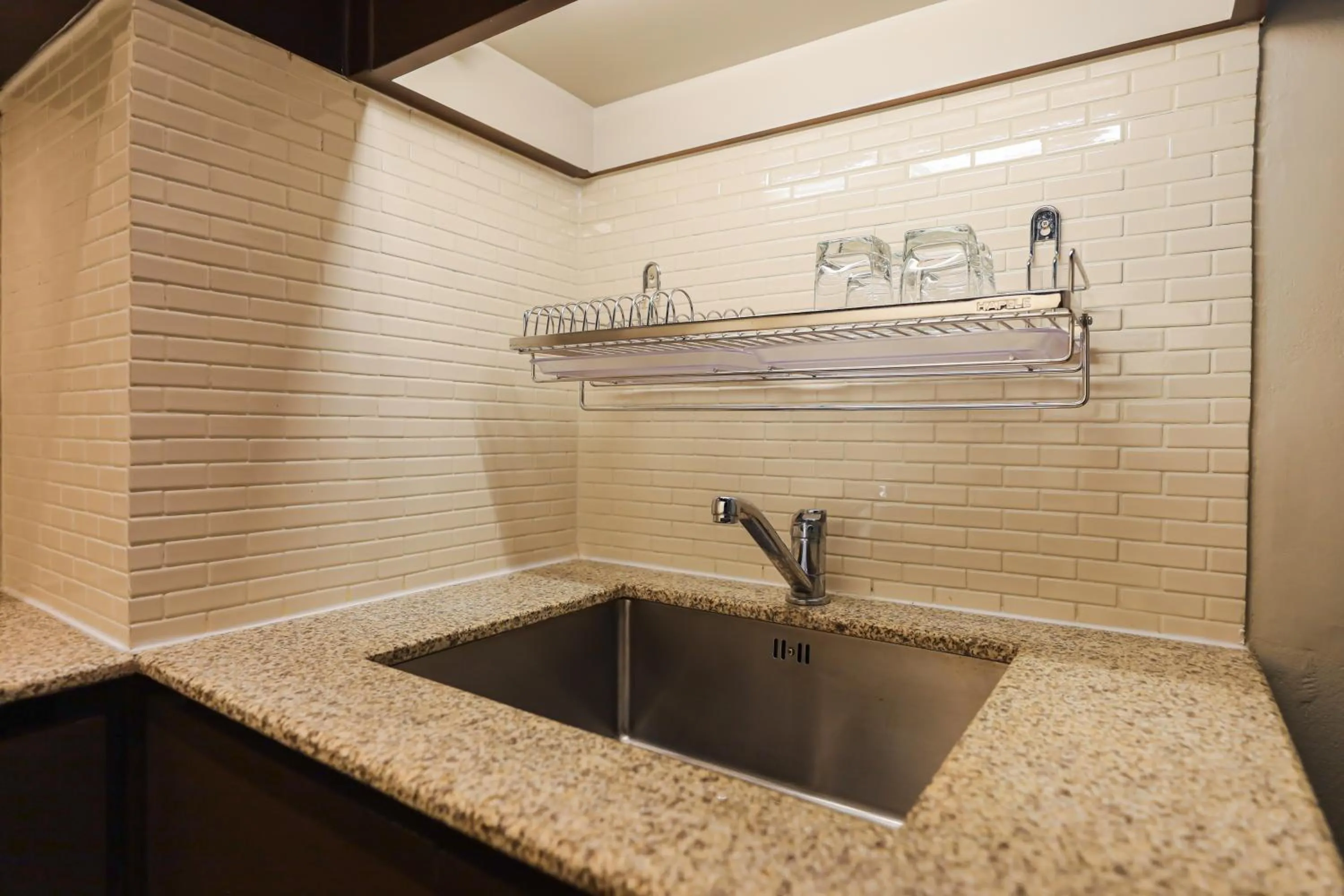 Kitchen or kitchenette in Balcony Courtyard Sriracha Hotel & Serviced Apartments