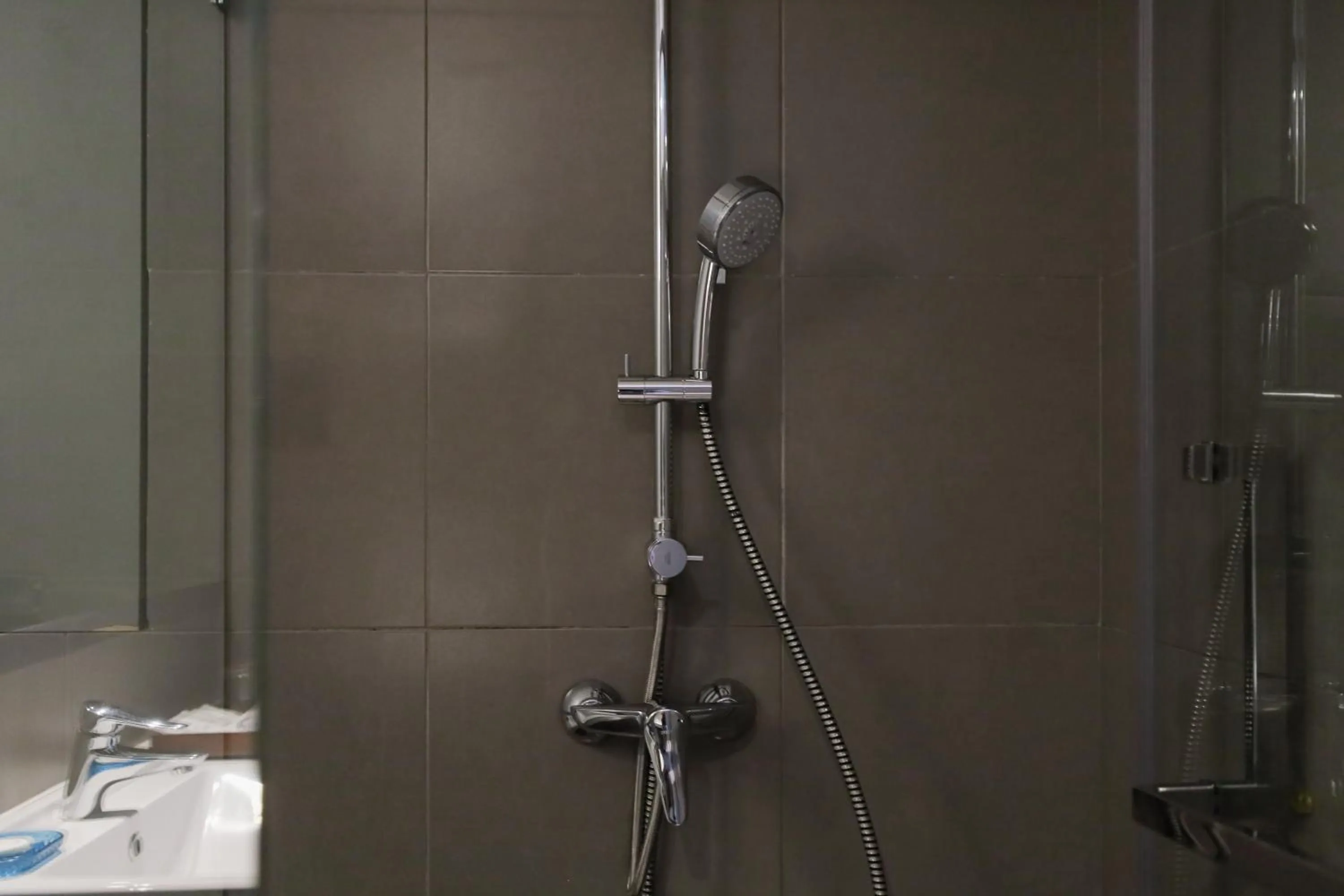 Shower in Balcony Courtyard Sriracha Hotel & Serviced Apartments