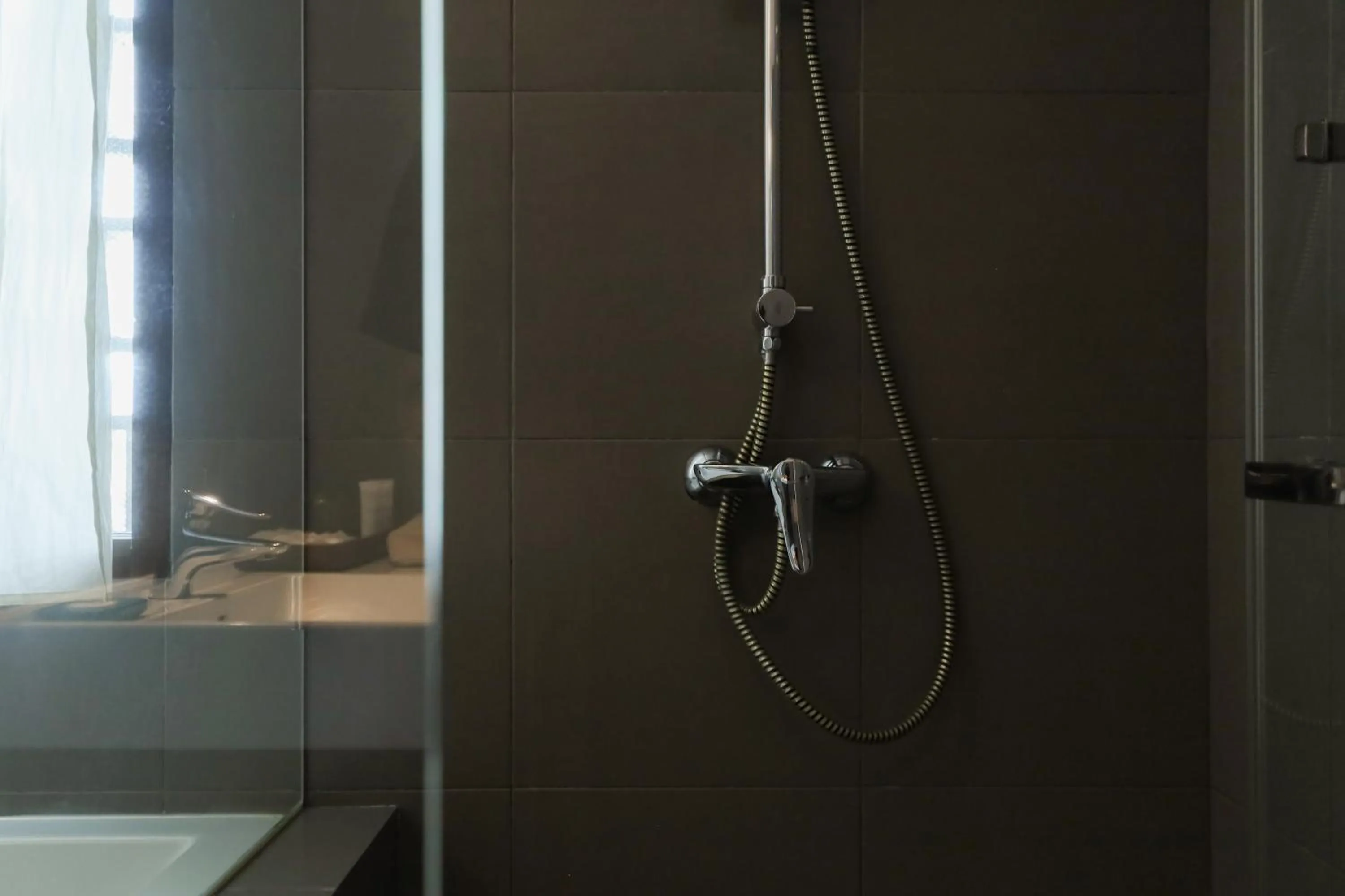 Shower in Balcony Courtyard Sriracha Hotel & Serviced Apartments