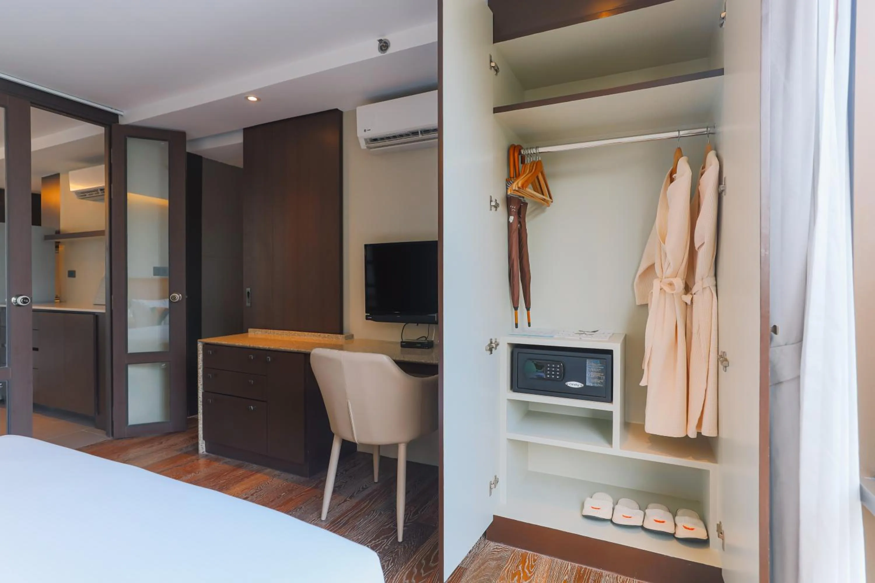 TV and multimedia, Bed in Balcony Courtyard Sriracha Hotel & Serviced Apartments